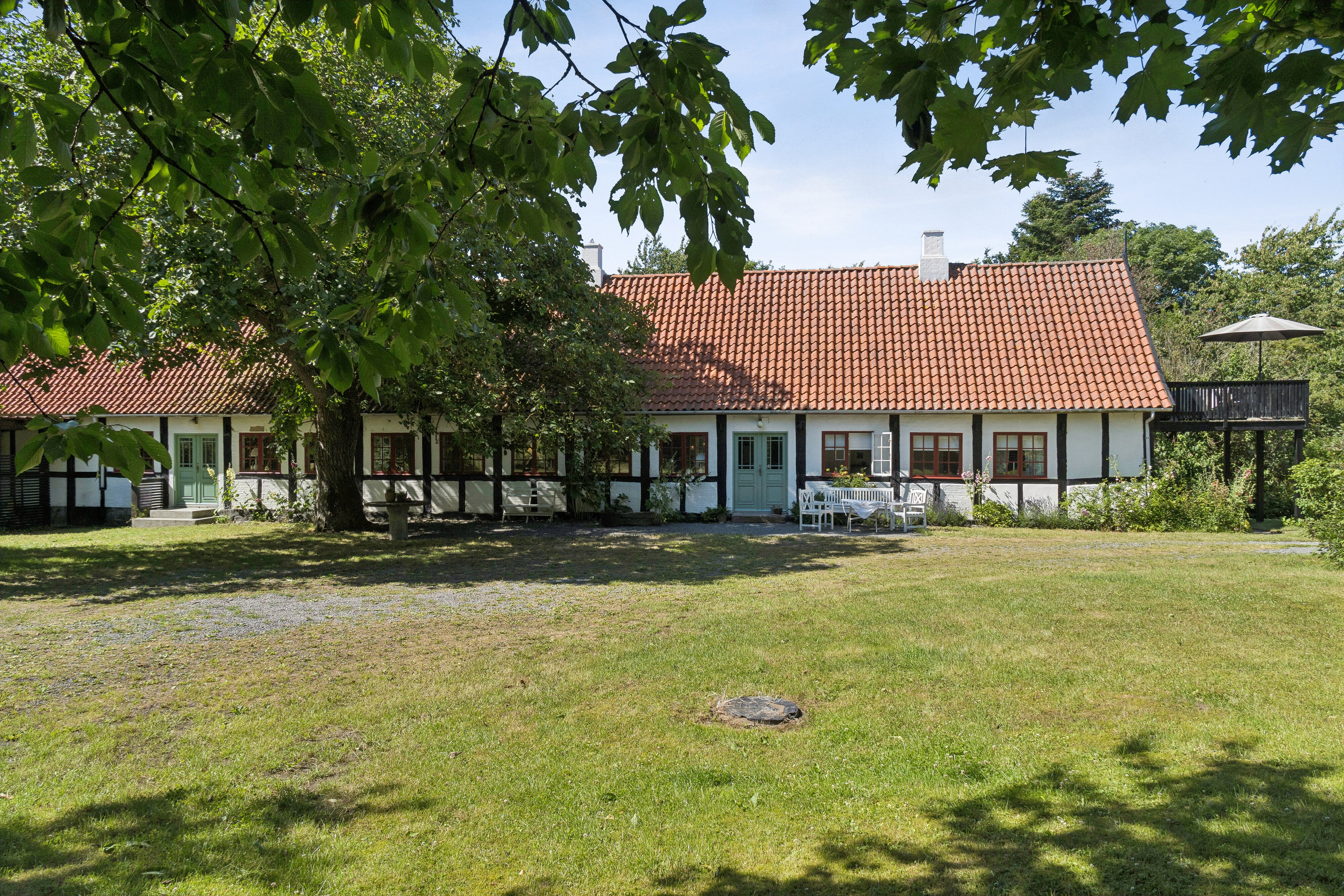 Fremhævet set fra haven billede i fuldskærmstilstand. Billede af Saltunavej 3, 3751 Østermarie