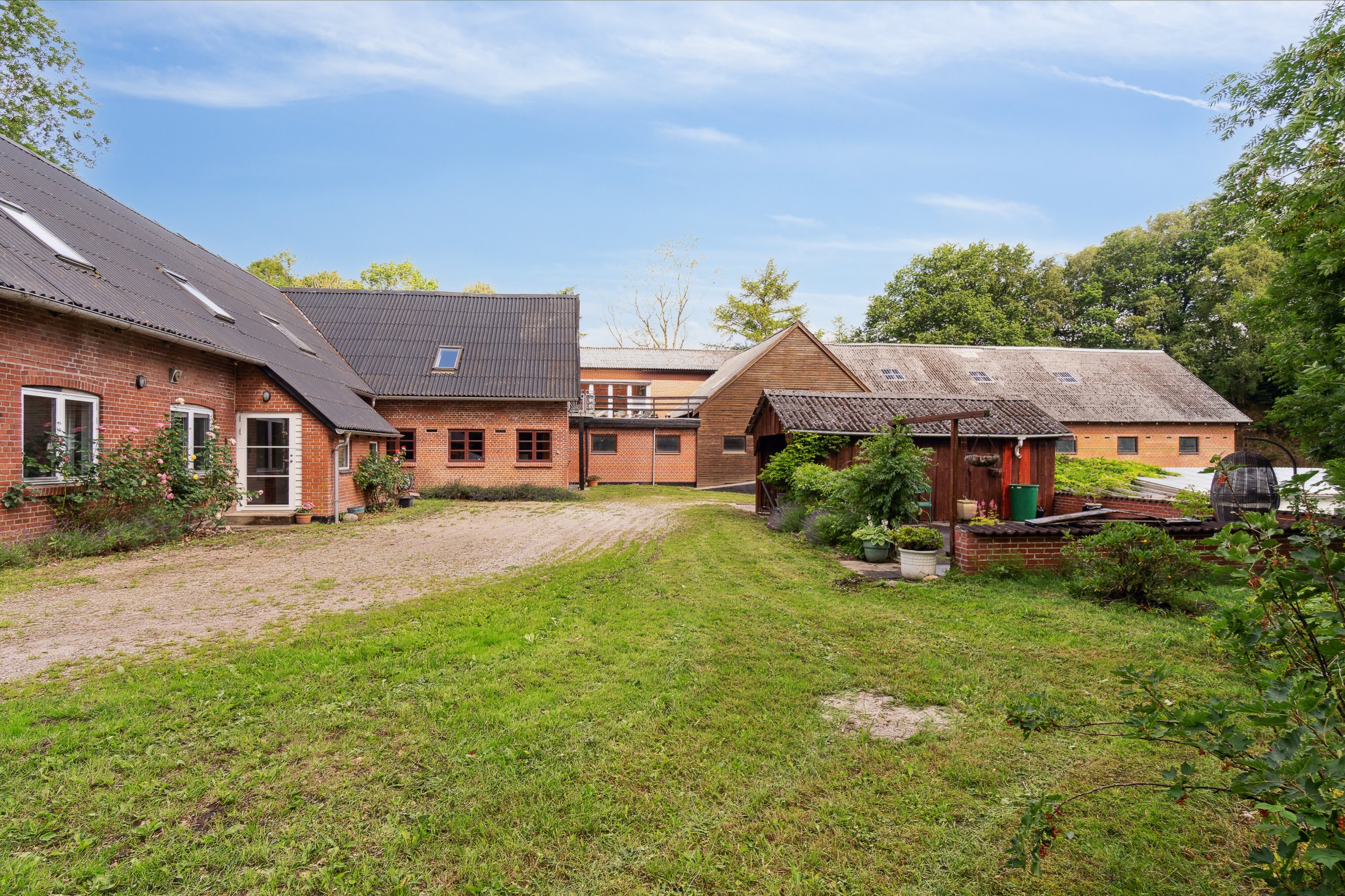 Fremhævet set fra haven billede i fuldskærmstilstand. Billede af Svostrupvej 27, 8883 Gjern