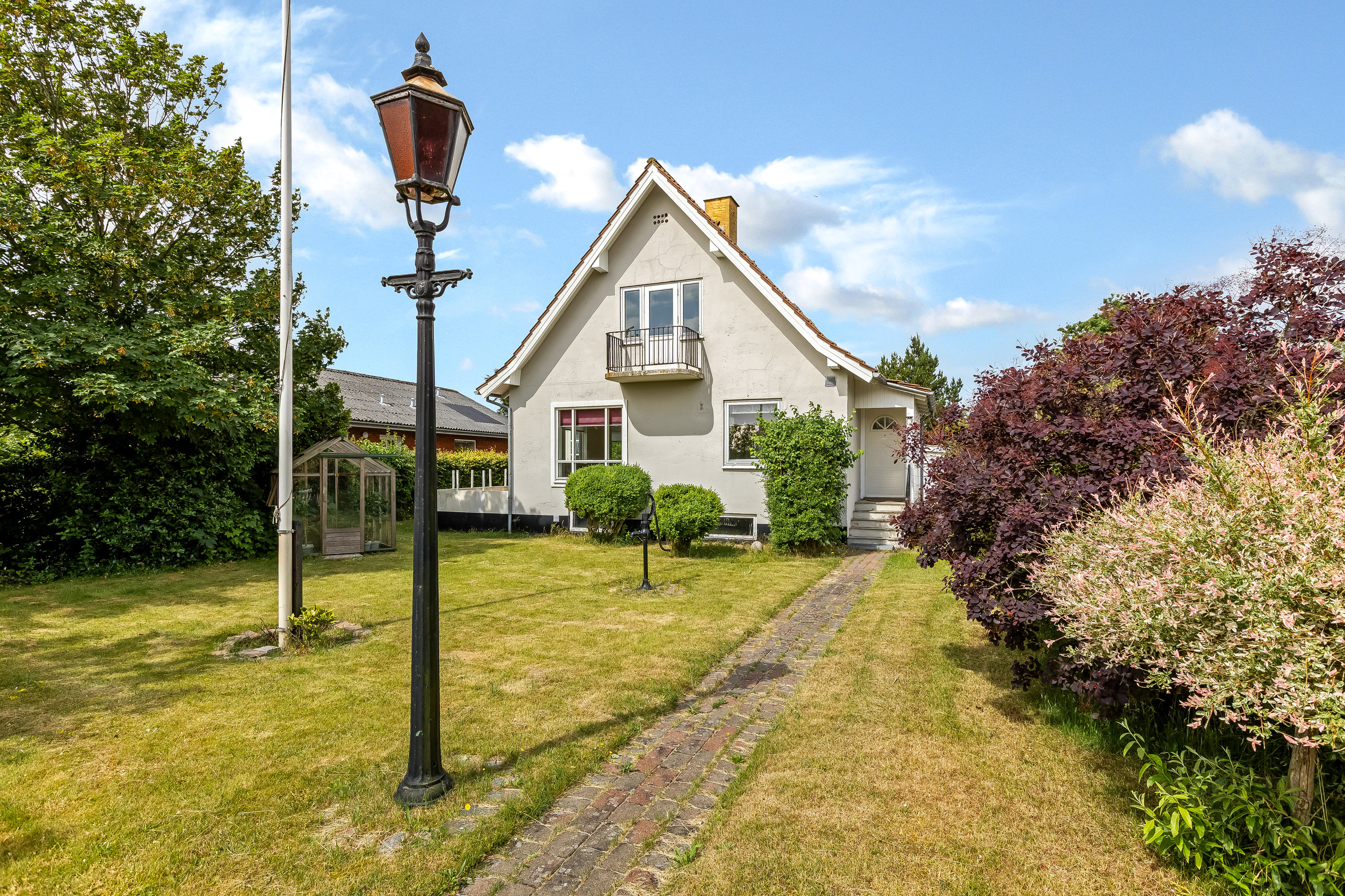 Fremhævet facade billede i fuldskærmstilstand. Billede af Vestervejen 63, Nordby, 6720 Fanø