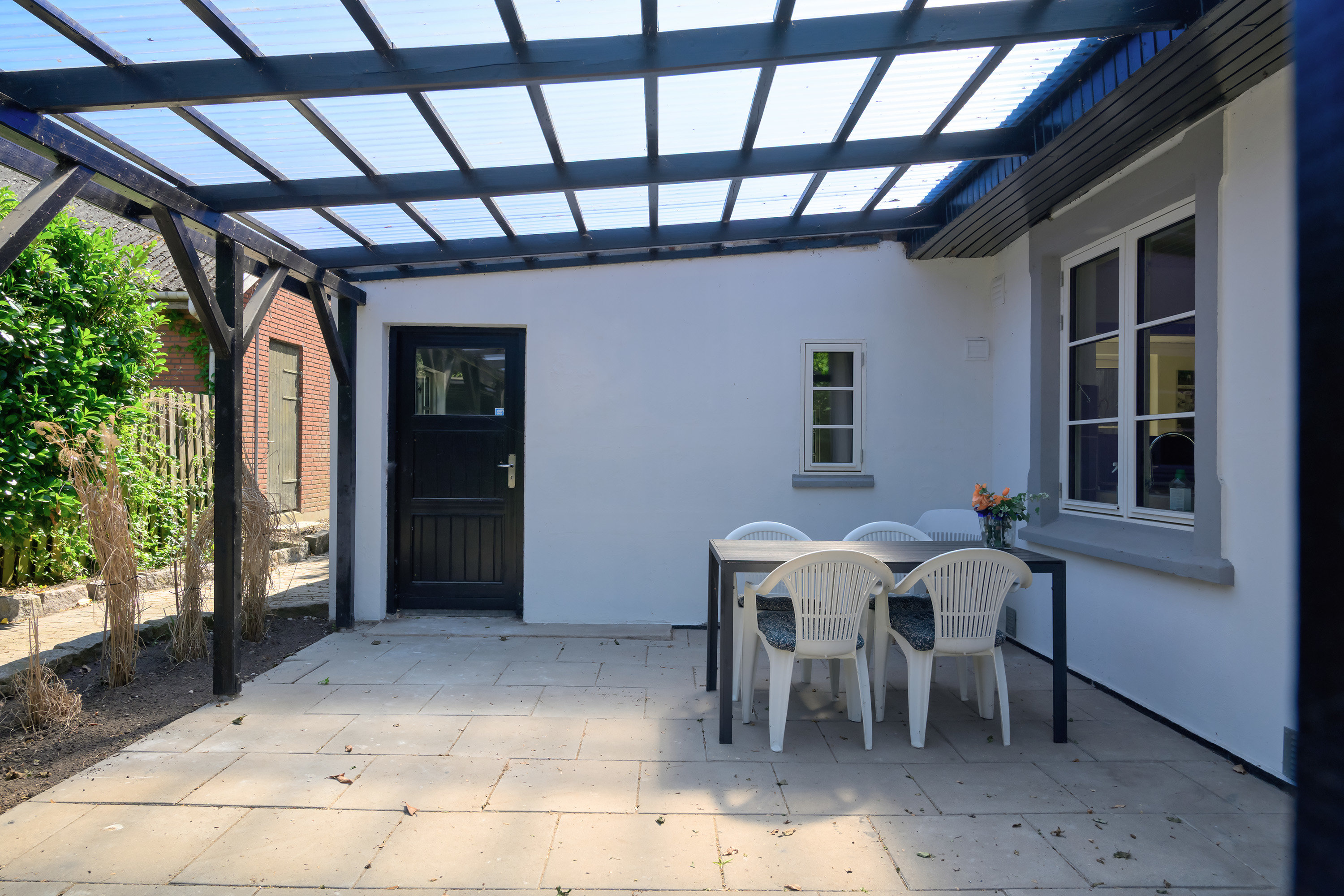 Fremhævet overdækket terrasse billede i fuldskærmstilstand. Billede af Væggerløsevej 13A, 4873 Væggerløse