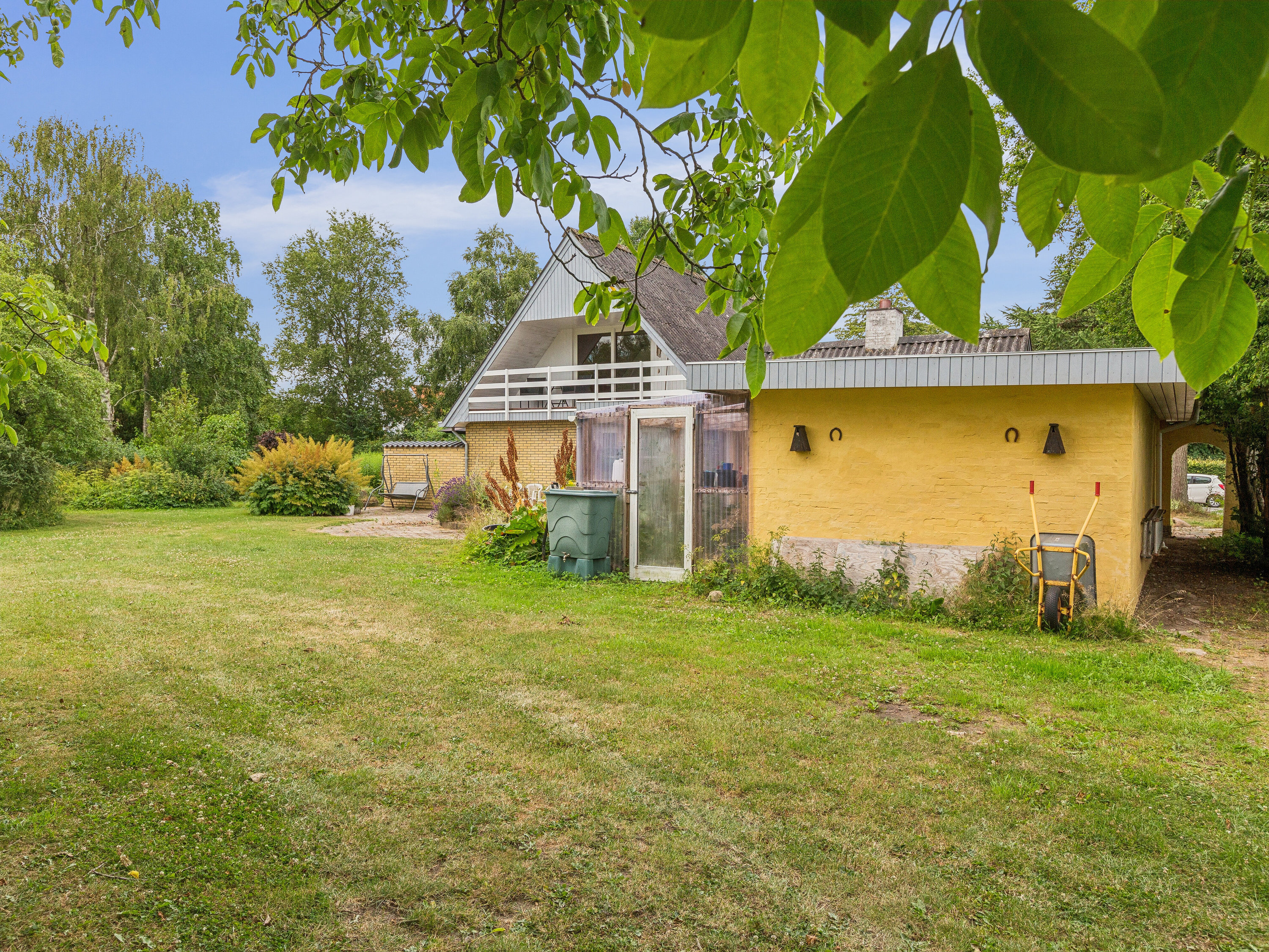 Fremhævet set fra haven billede i fuldskærmstilstand. Billede af Kirkevej 124, Tolnekirkeby, 9870 Sindal