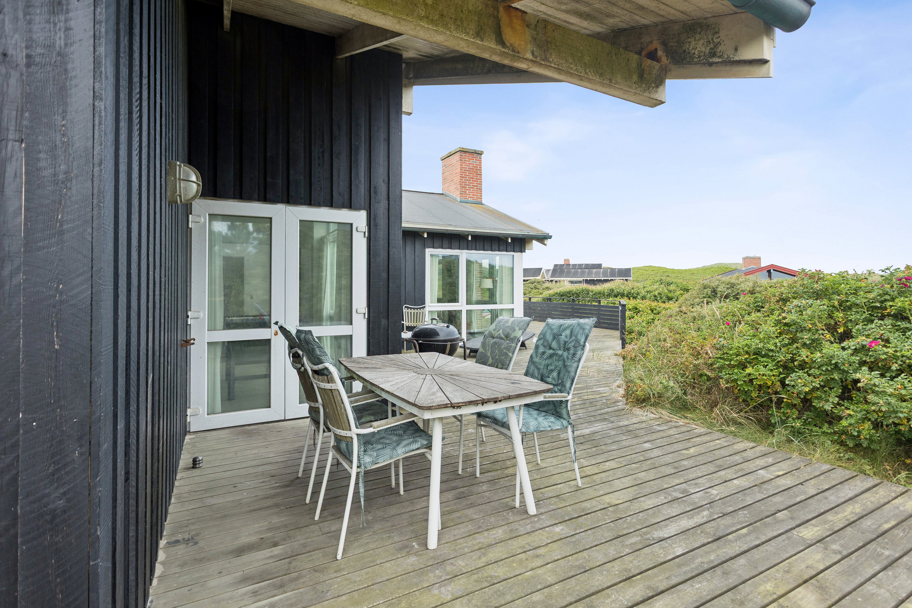 Fremhævet overdækket terrasse billede i fuldskærmstilstand. Billede af Hedvigsvej 8, Munkens Klit, 9480 Løkken