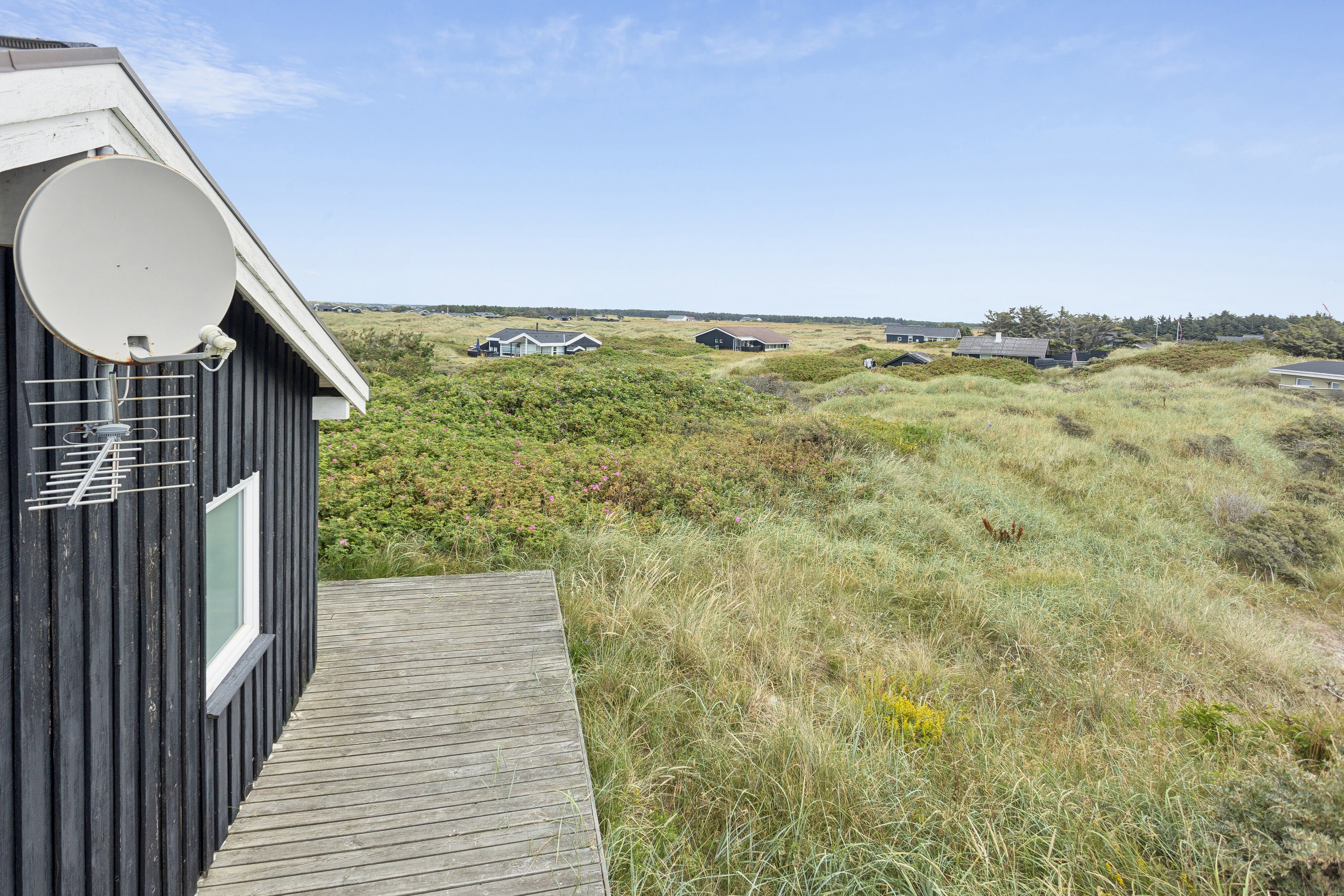 Fremhævet set fra haven billede i fuldskærmstilstand. Billede af Hedvigsvej 8, Munkens Klit, 9480 Løkken