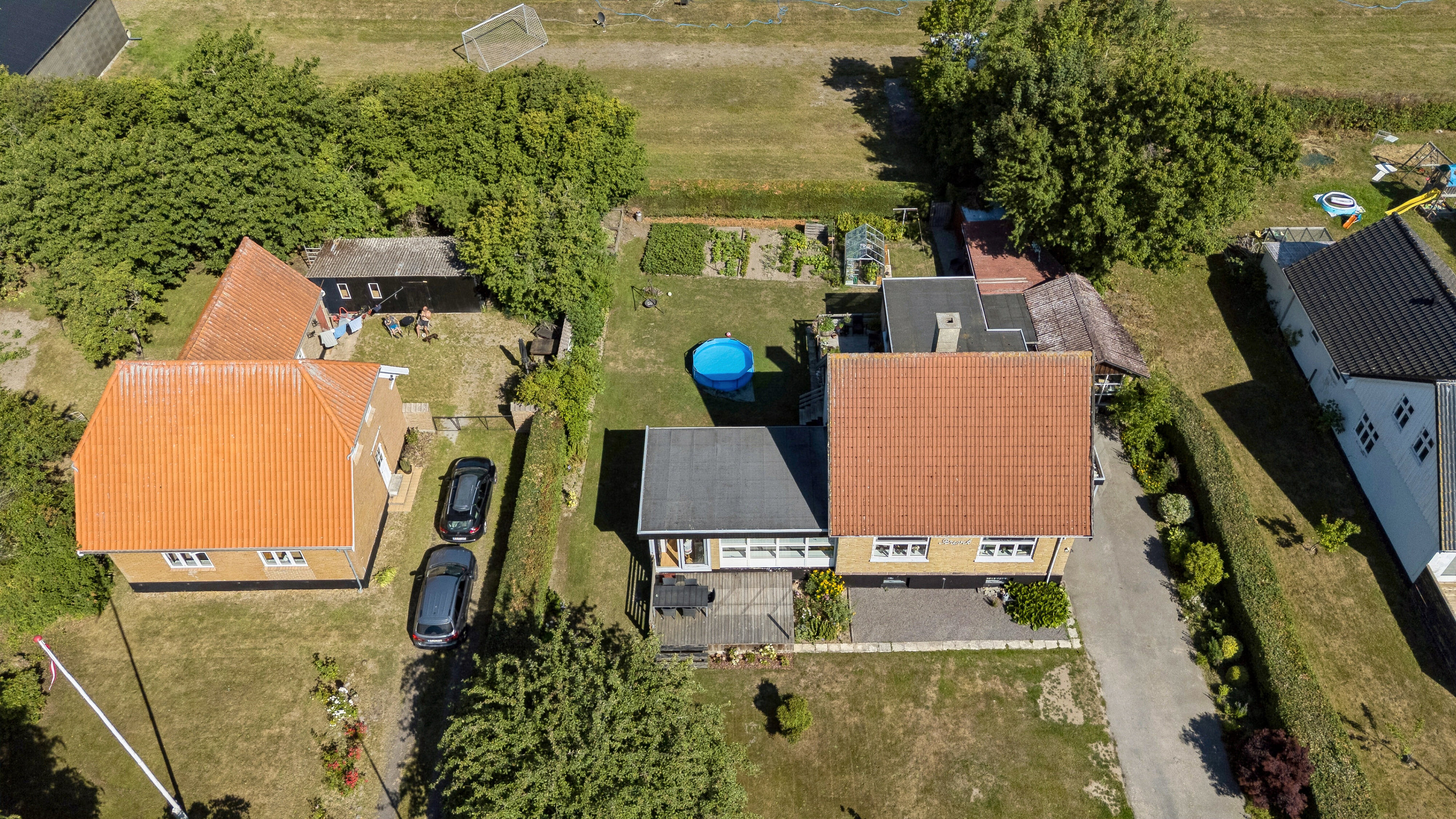 Fremhævet luftfoto billede i fuldskærmstilstand. Billede af Stavsdalvej 24, Østerlars, 3760 Gudhjem