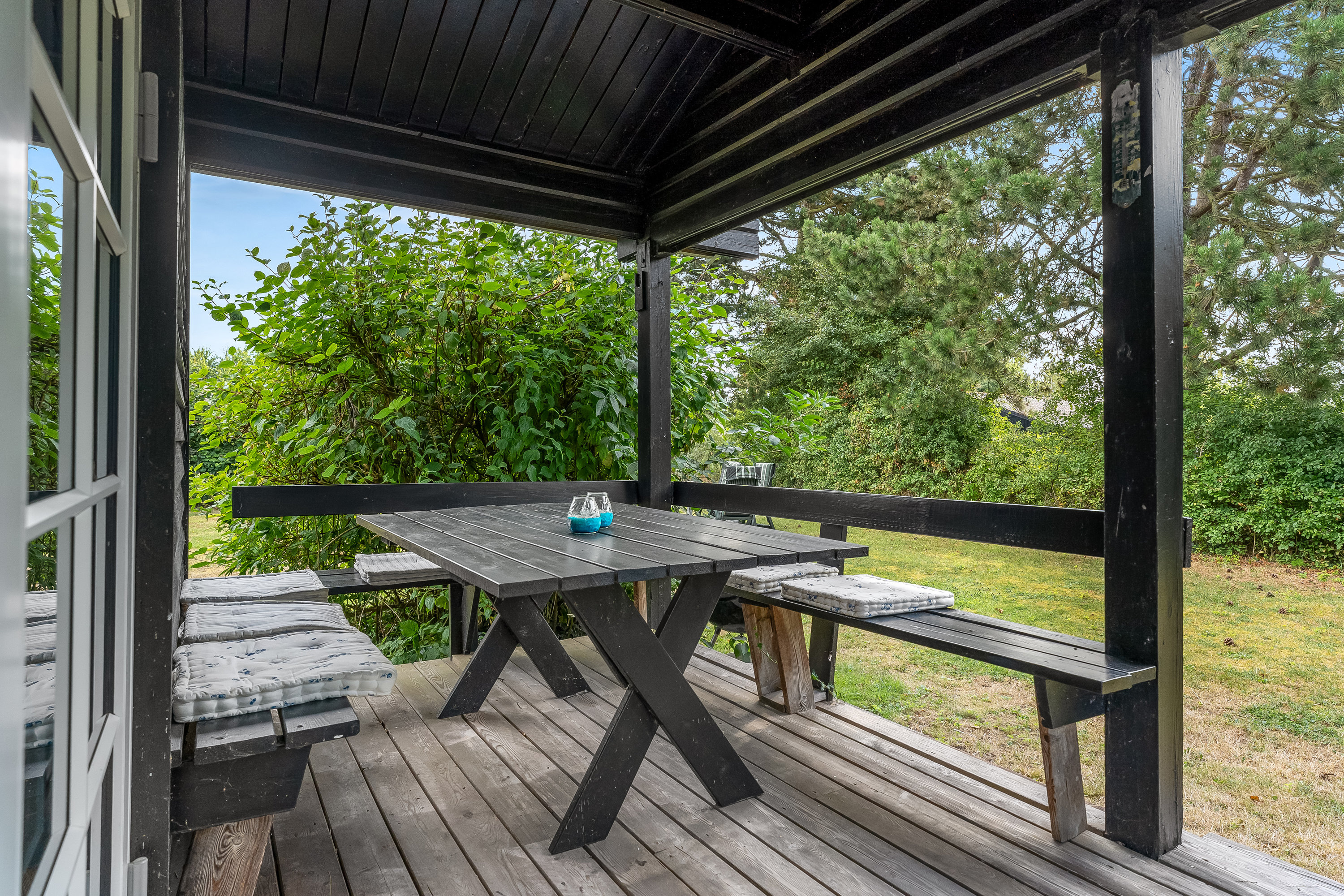 Fremhævet overdækket terrasse billede i fuldskærmstilstand. Billede af Lyngvej 16, 4945 Femø