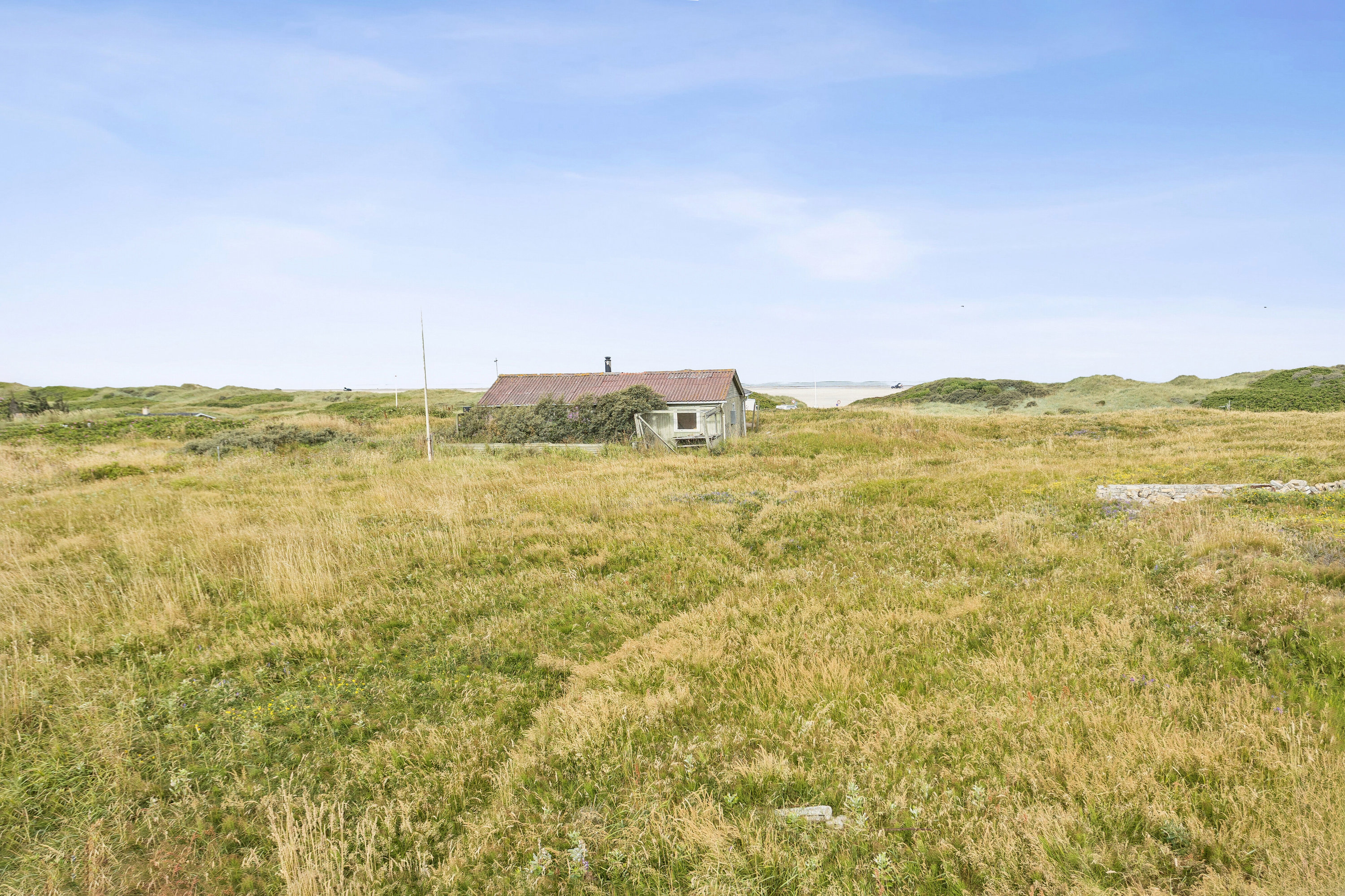 Fremhævet set fra haven billede i fuldskærmstilstand. Billede af Lottesvej 5, Grønhøj, 9480 Løkken