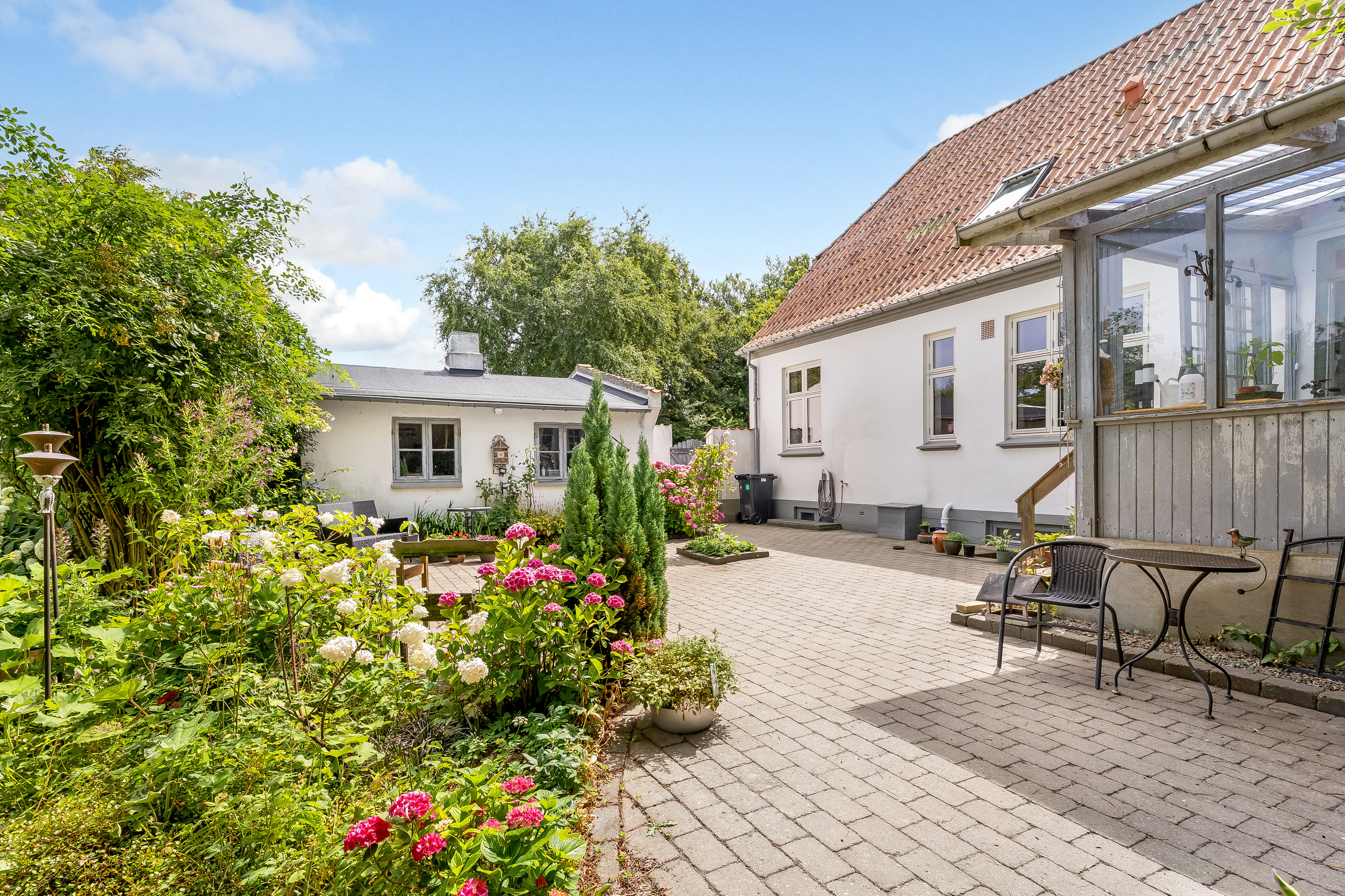 Fremhævet terrasse billede i fuldskærmstilstand. Billede af Trætteskovvej 1, 4970 Rødby