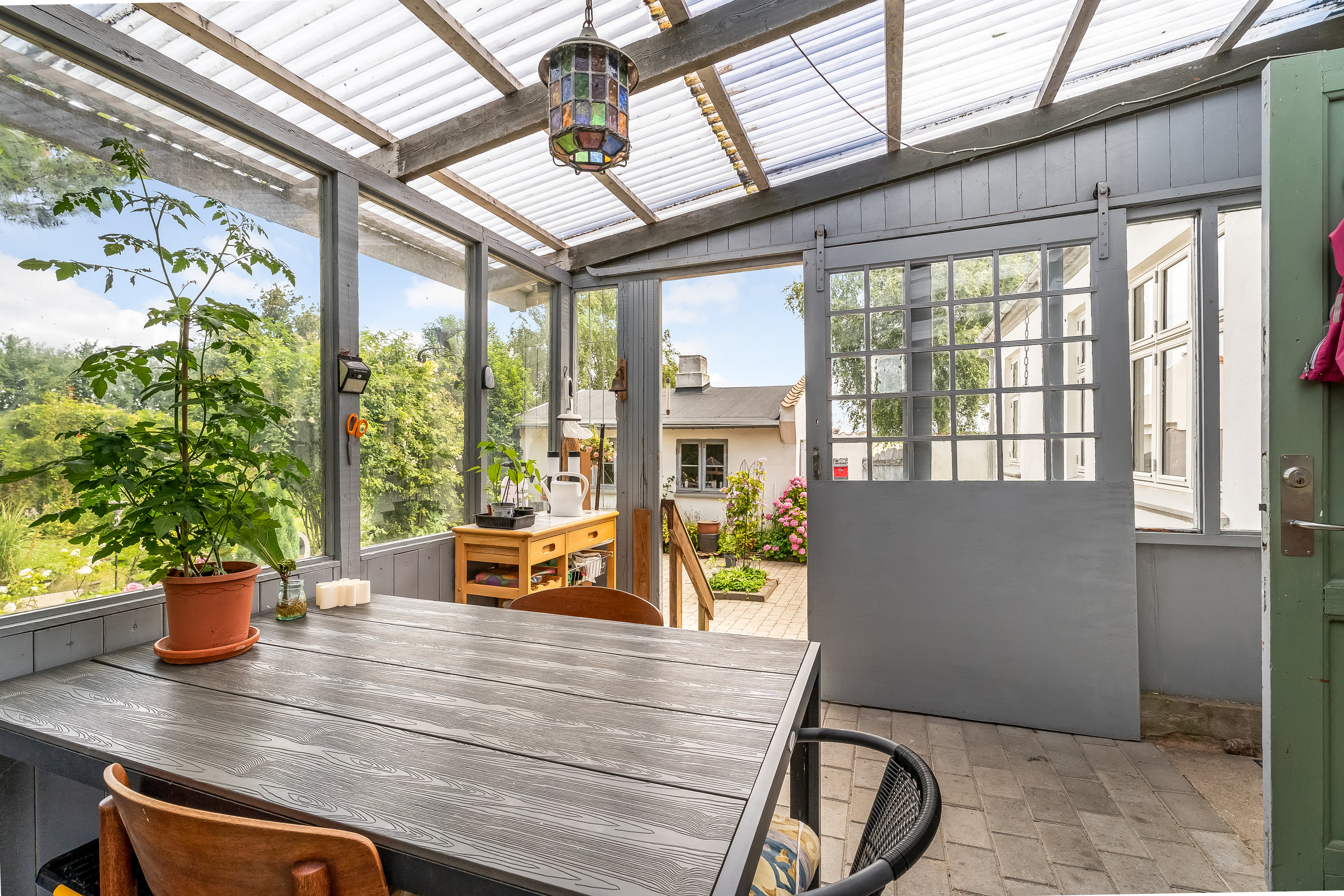 Fremhævet overdækket terrasse billede i fuldskærmstilstand. Billede af Trætteskovvej 1, 4970 Rødby