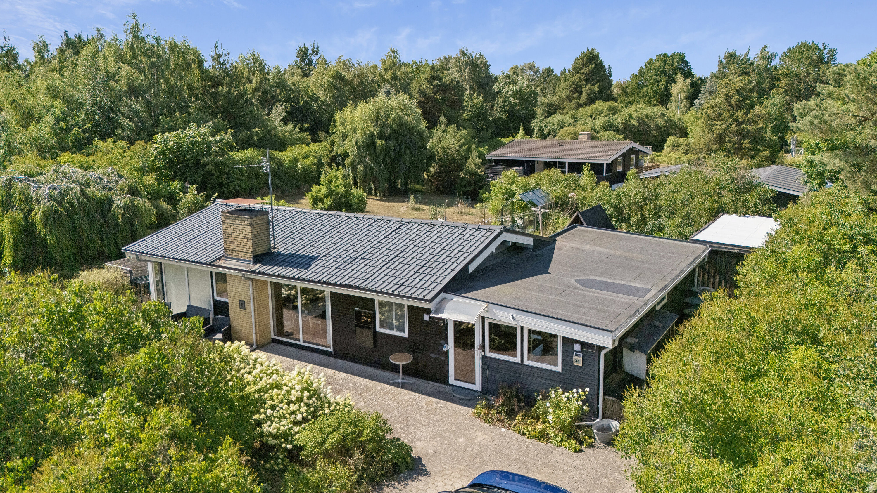 Fremhævet set fra vejen billede i fuldskærmstilstand. Billede af Lynggærdevej 34, Stenstrup L, 4573 Højby