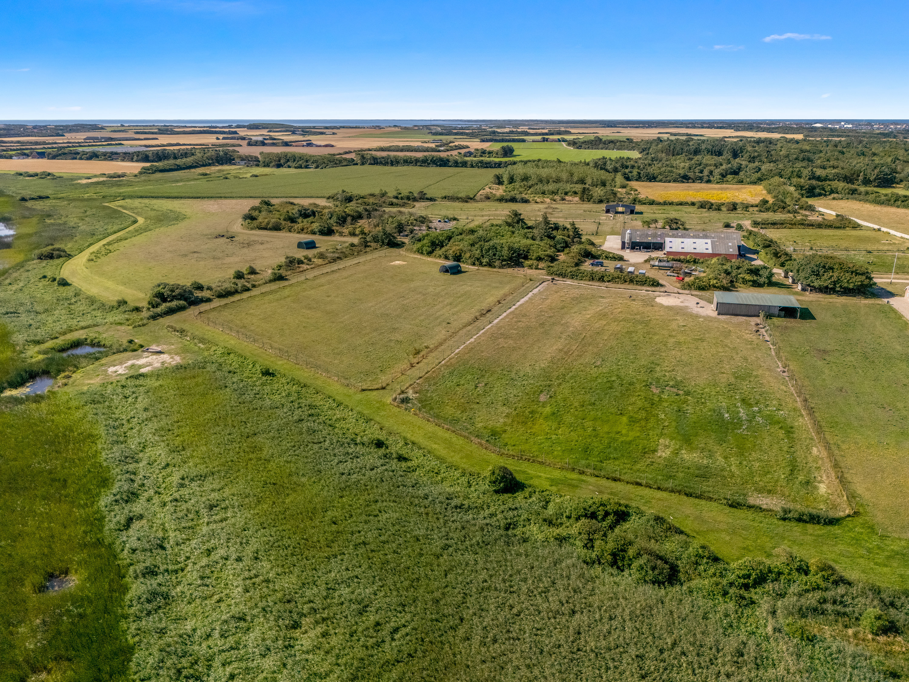Fremhævet luftfoto billede i fuldskærmstilstand. Billede af Tambjergvej 12, Lodbj Hede, 6950 Ringkøbing