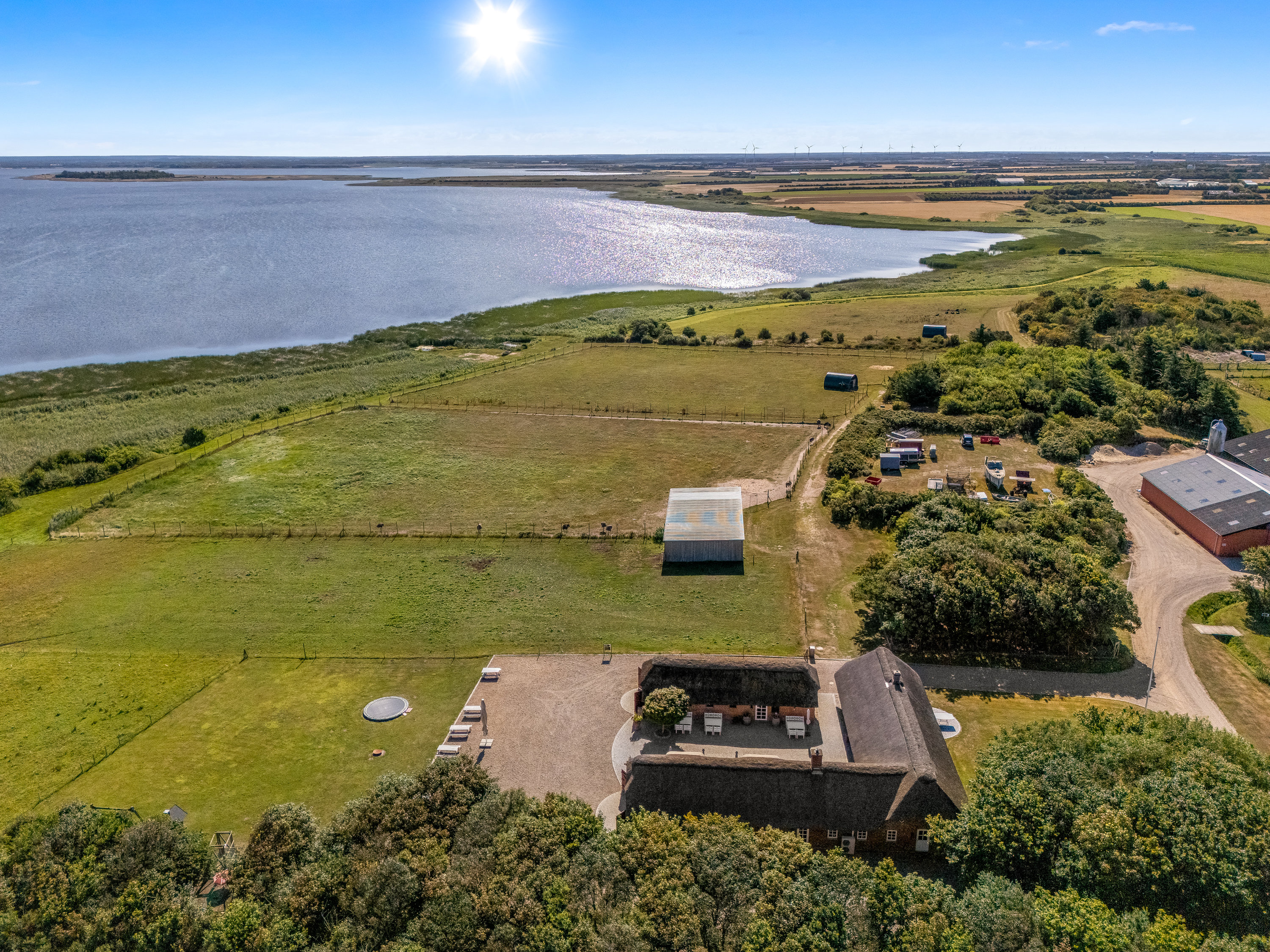 Fremhævet luftfoto billede i fuldskærmstilstand. Billede af Tambjergvej 12, Lodbj Hede, 6950 Ringkøbing