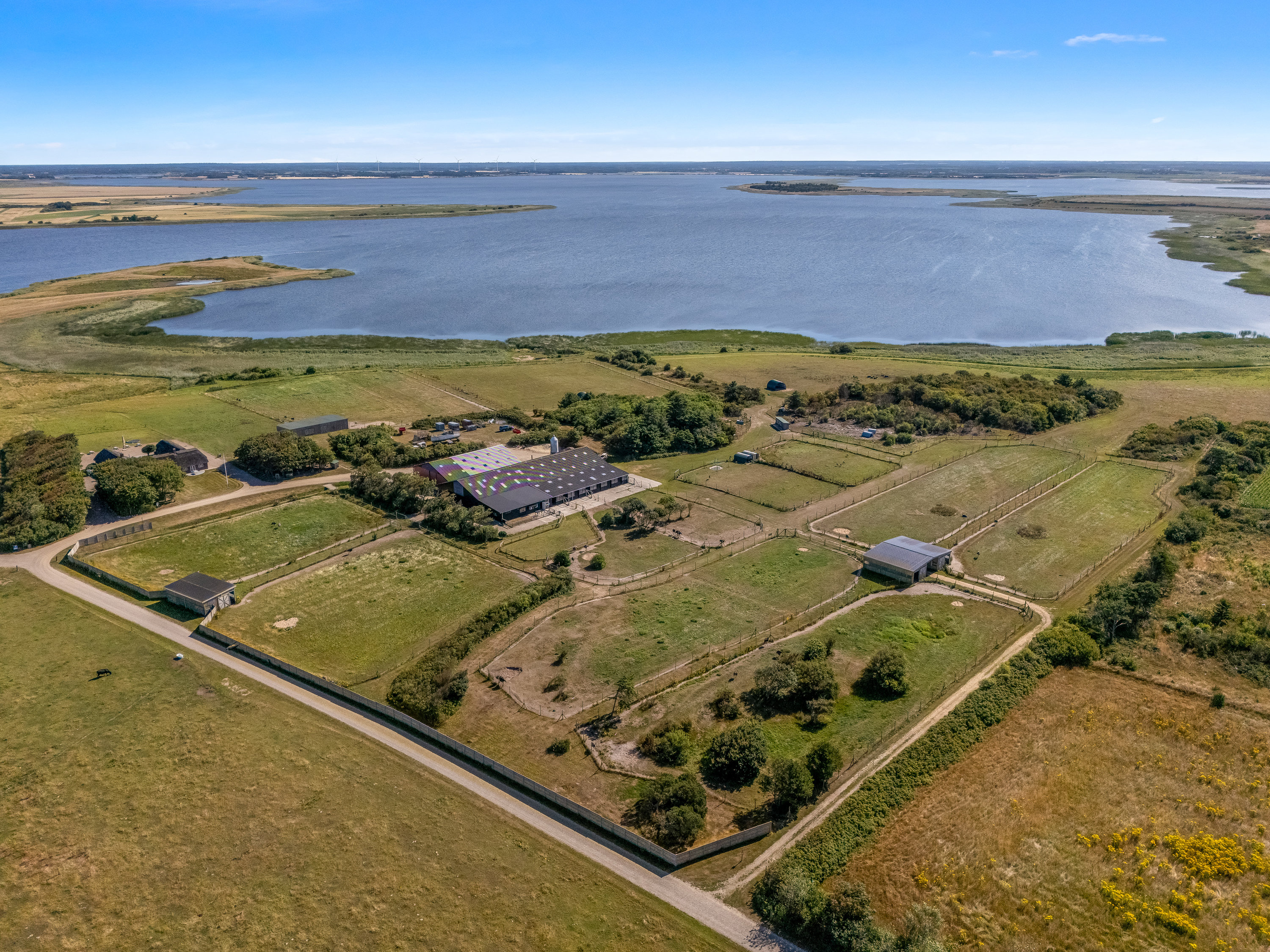 Fremhævet luftfoto billede i fuldskærmstilstand. Billede af Tambjergvej 12, Lodbj Hede, 6950 Ringkøbing