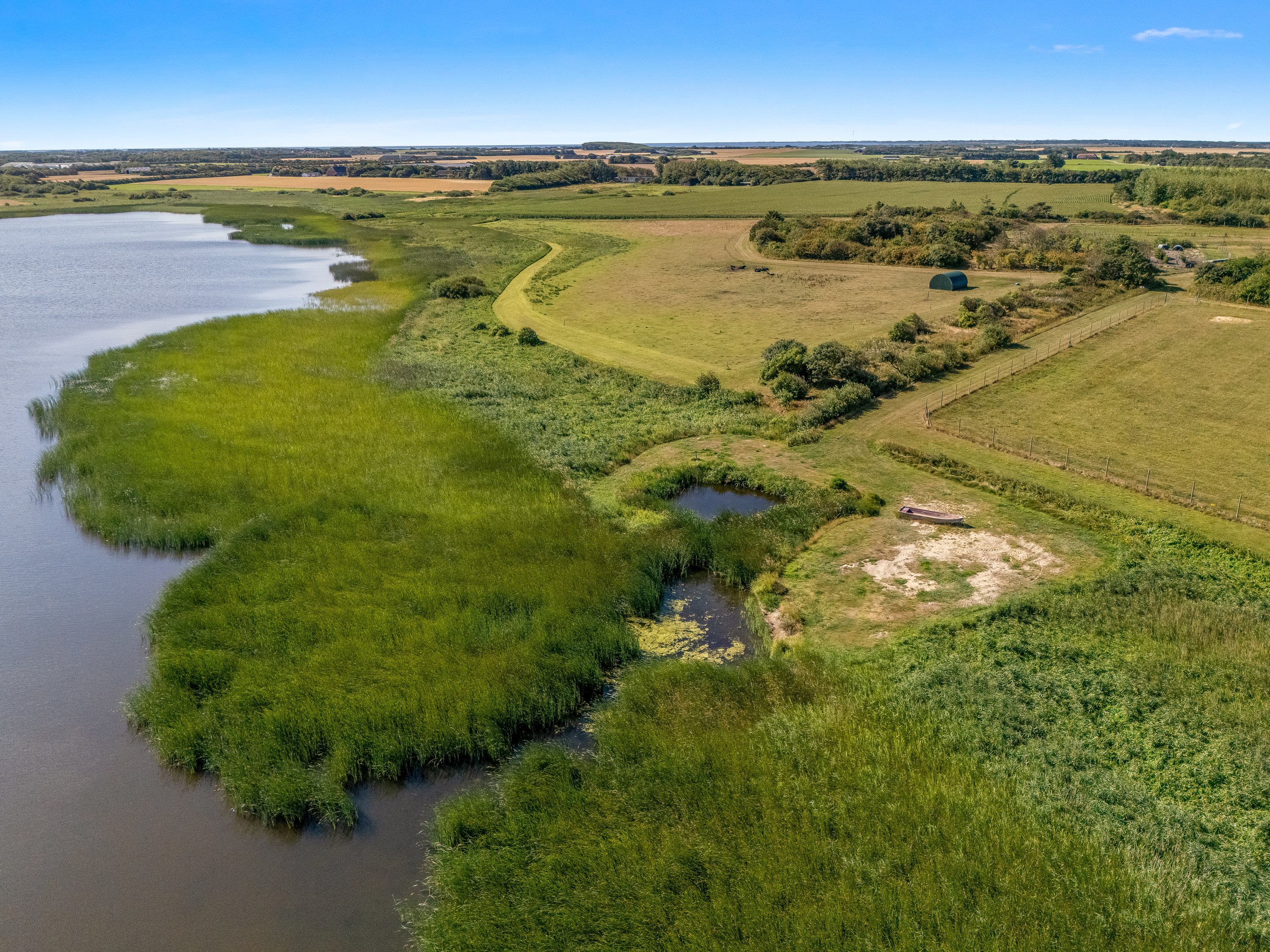Fremhævet luftfoto billede i fuldskærmstilstand. Billede af Tambjergvej 12, Lodbj Hede, 6950 Ringkøbing