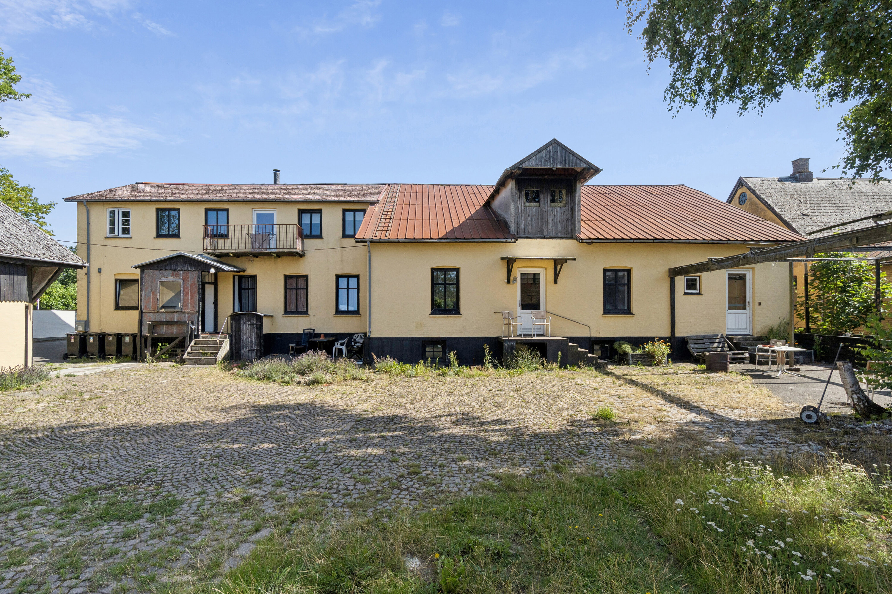 Fremhævet set fra haven billede i fuldskærmstilstand. Billede af Godthåbsvej 29, Østermarie, 3751 Østermarie
