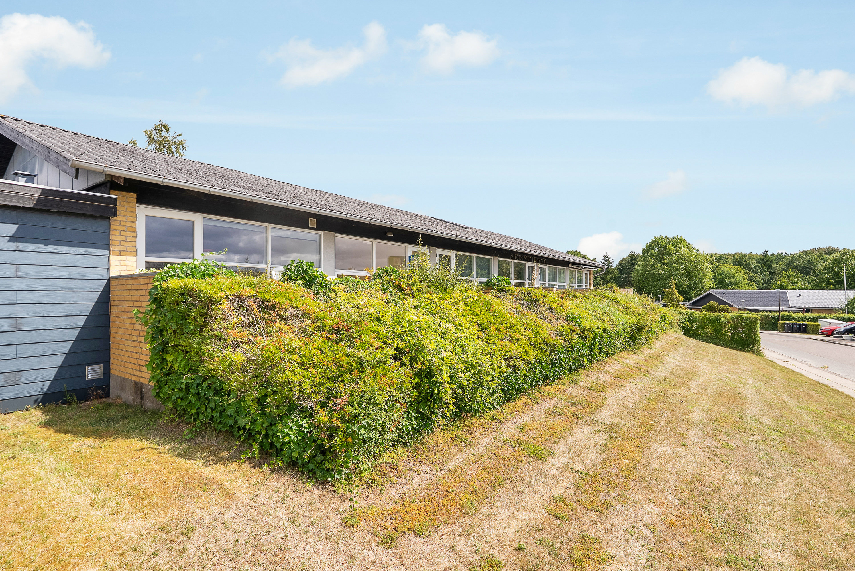 Fremhævet facade billede i fuldskærmstilstand. Billede af Louisevænget 14, st. 20., Næsby, 5270 Odense N