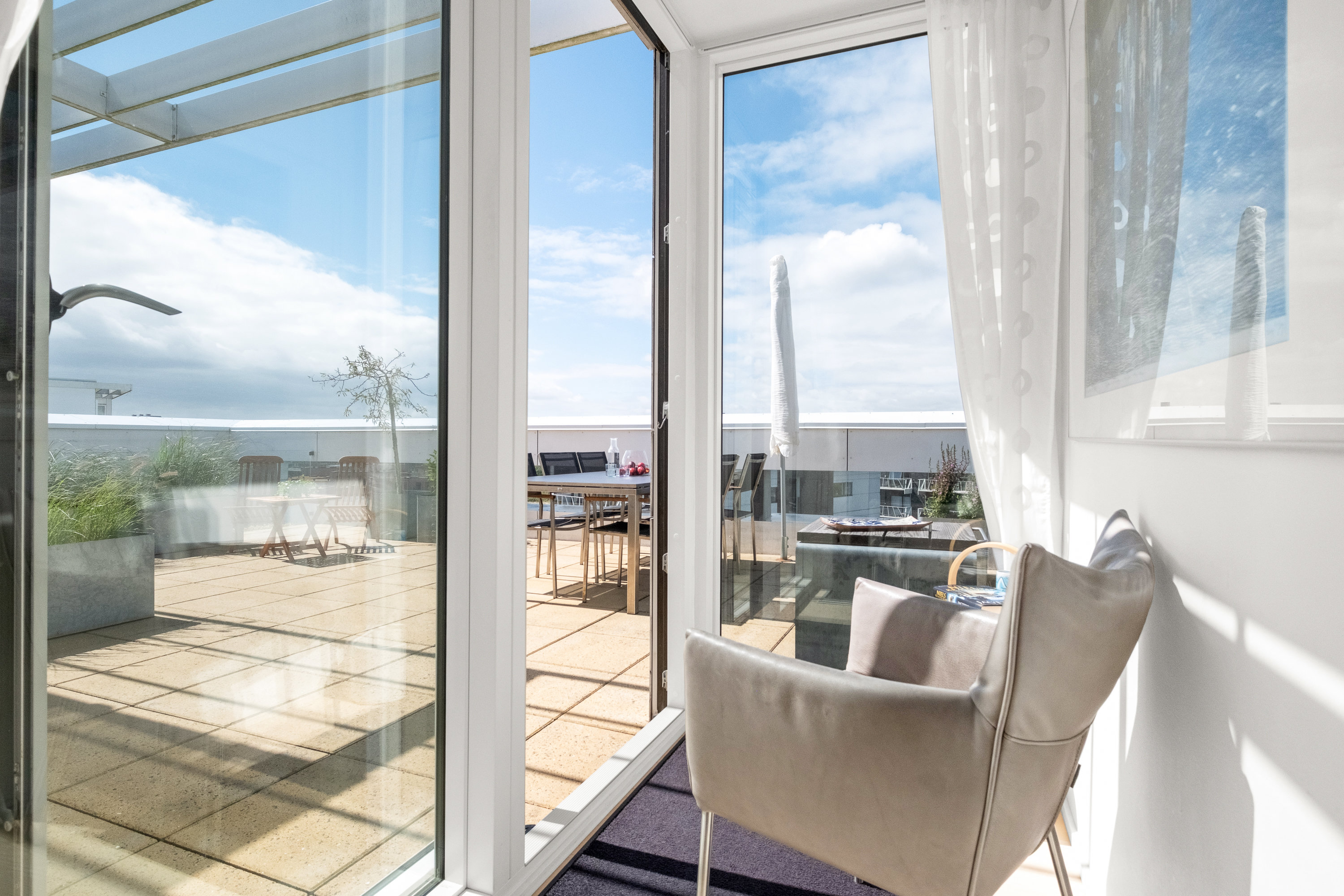 Fremhævet tagterrasse billede i fuldskærmstilstand. Billede af Åhusene 6, 9. 1., 8000 Aarhus C