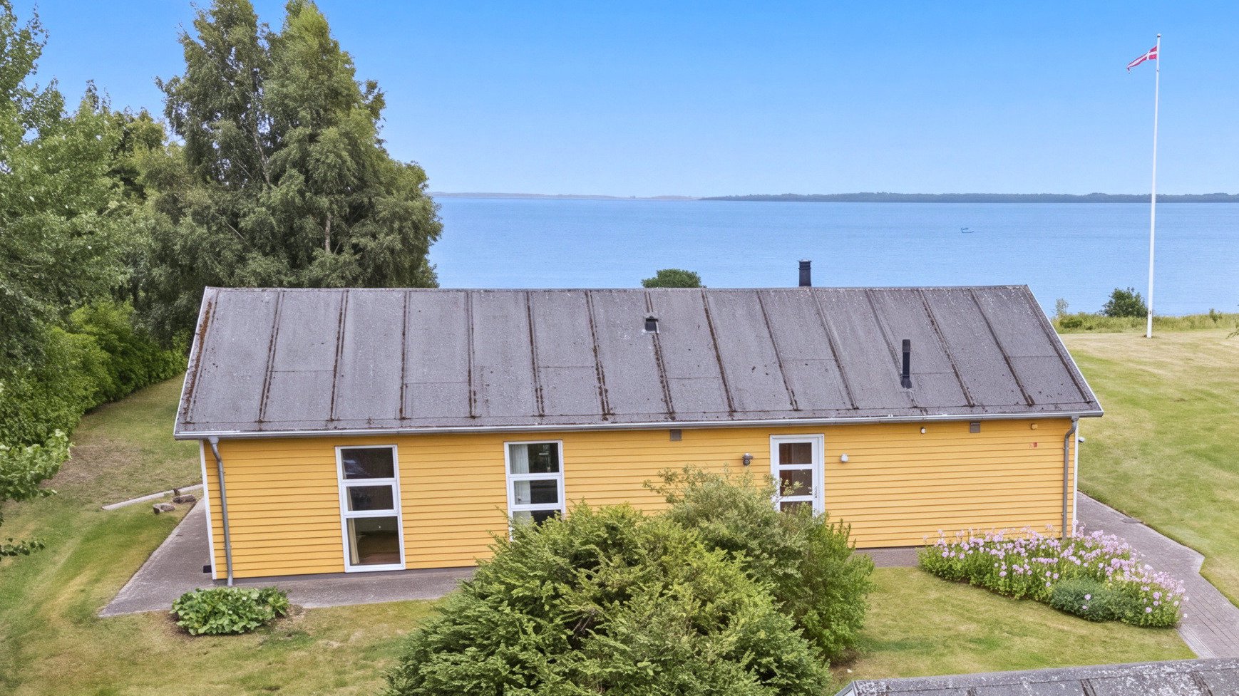 Fremhævet set fra haven billede i fuldskærmstilstand. Billede af Gl. Møllevej 62, Hanehoved, 3300 Frederiksværk