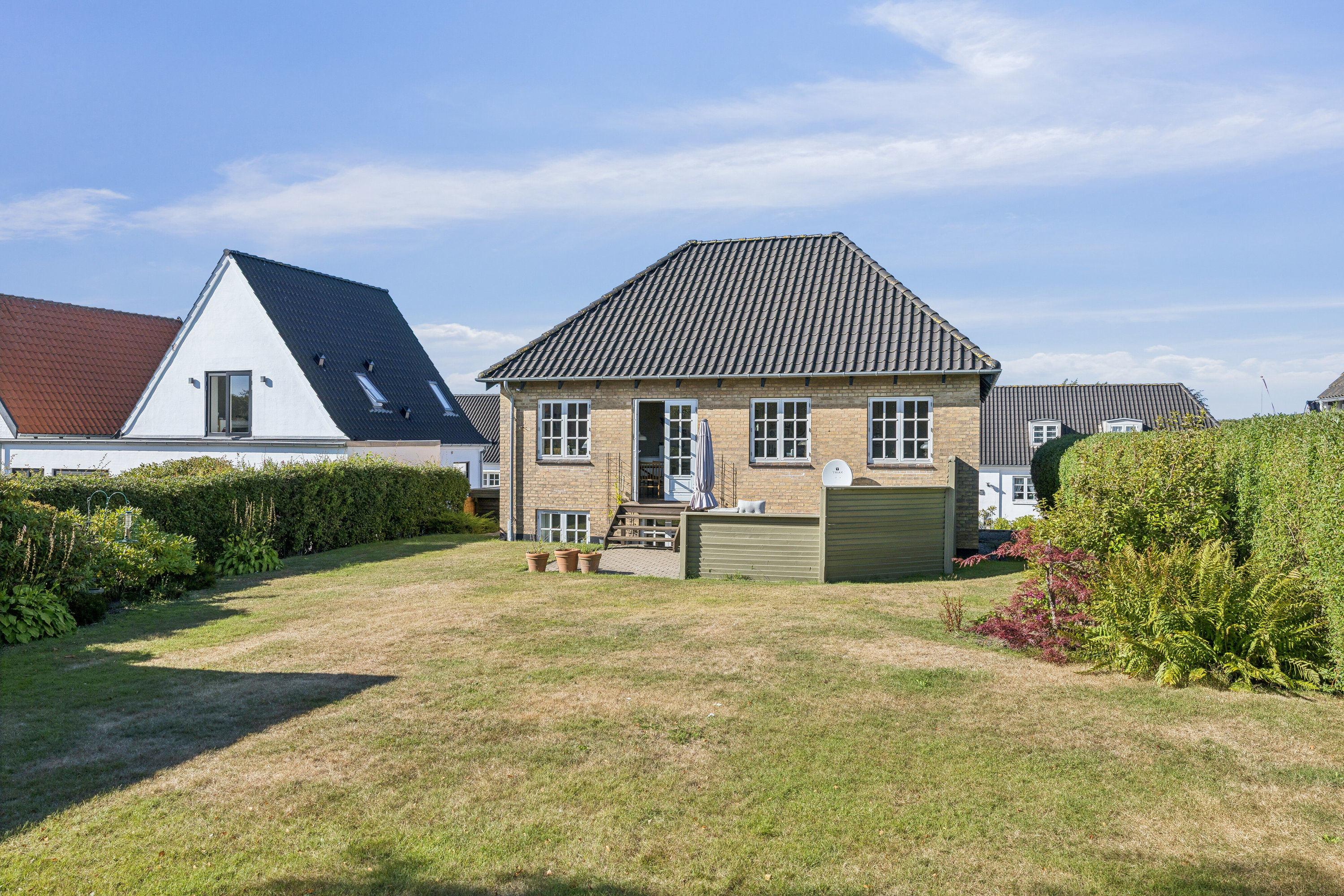 Fremhævet set fra haven billede i fuldskærmstilstand. Billede af Østre Alle 30, 9800 Hjørring