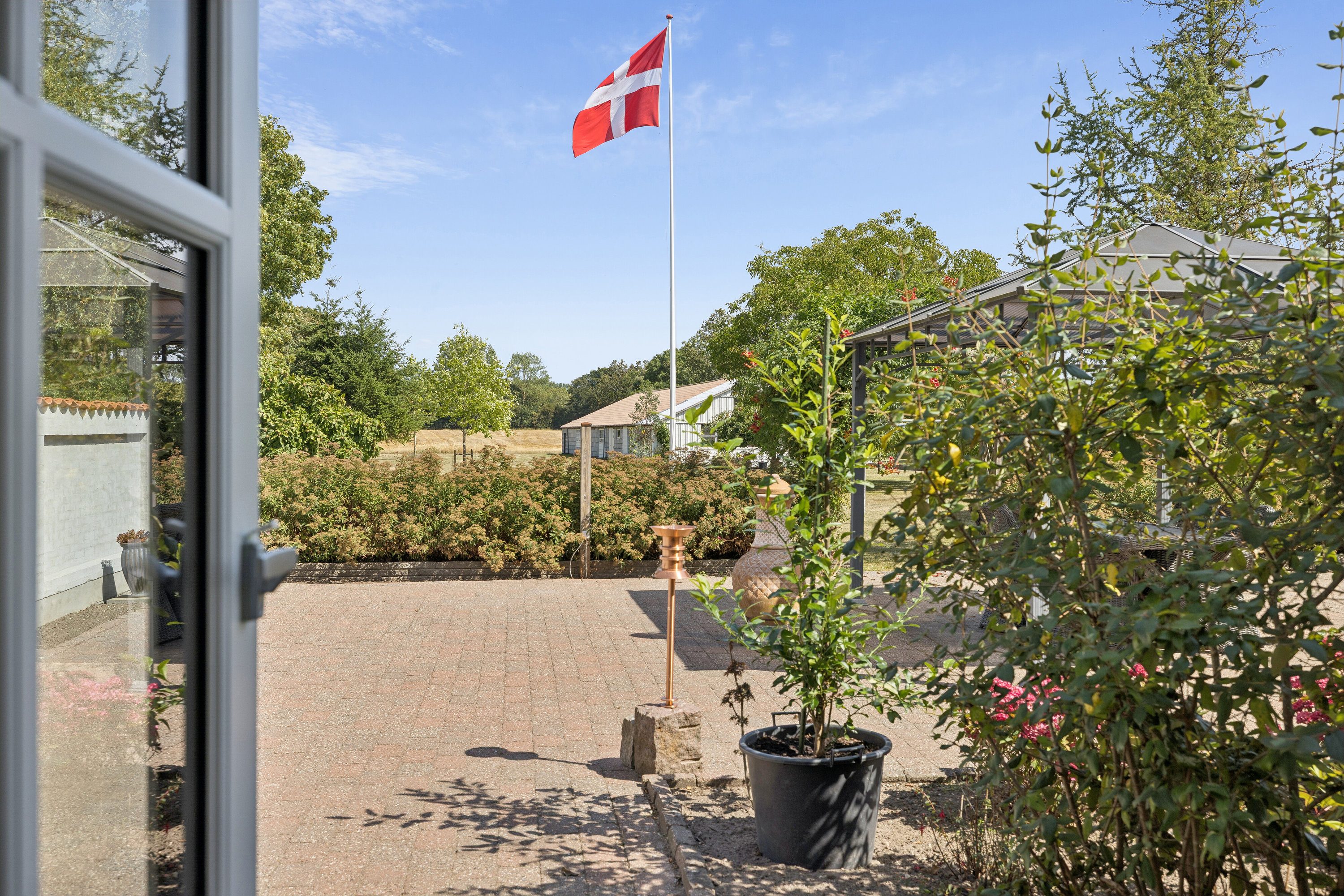 Fremhævet udendørs billede i fuldskærmstilstand. Billede af Ellingevej 30, Refsvindinge, 5853 Ørbæk