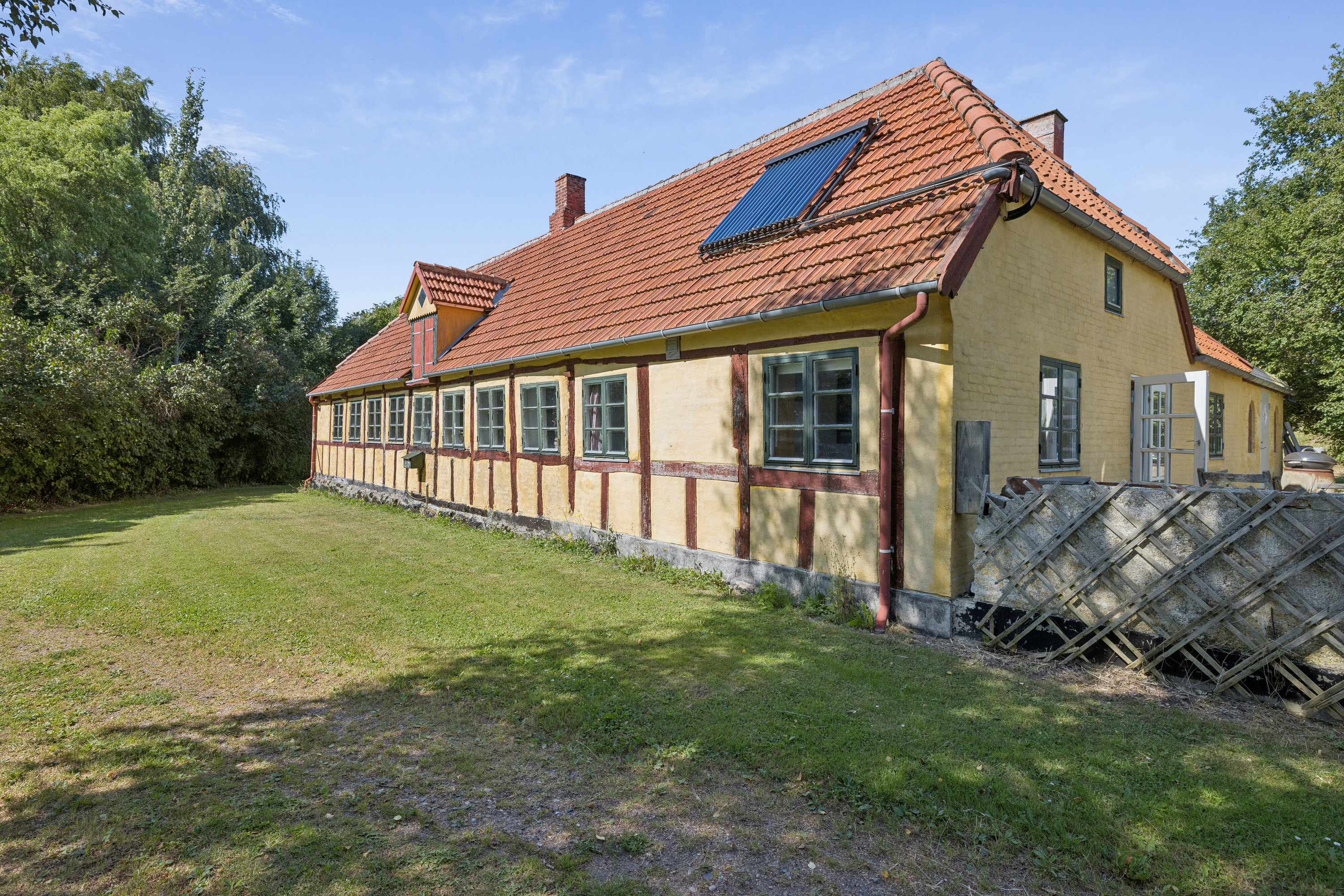 Fremhævet set fra haven billede i fuldskærmstilstand. Billede af Spodsbjergvej 219, Gammel Skrøbelev, 5900 Rudkøbing