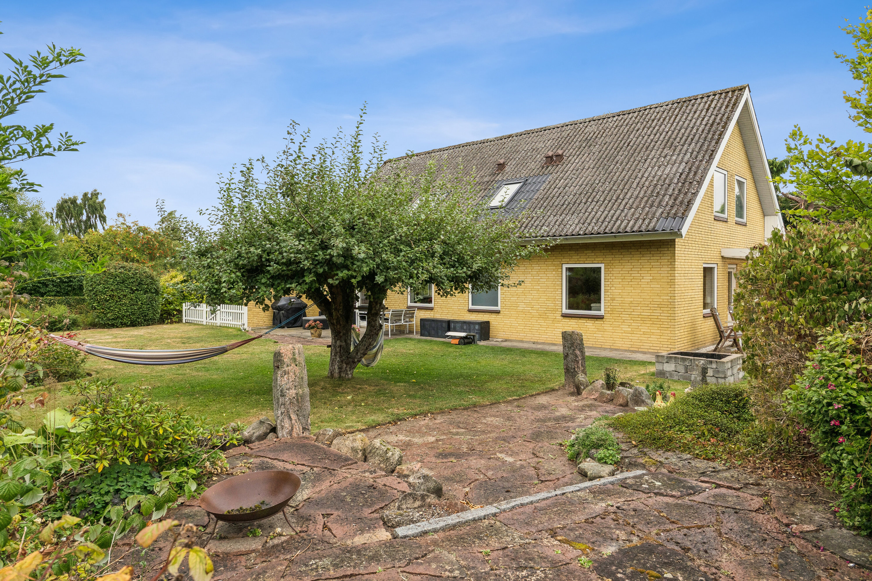 Fremhævet set fra haven billede i fuldskærmstilstand. Billede af Agerbakken 15, Ollerup, 5762 Vester Skerninge