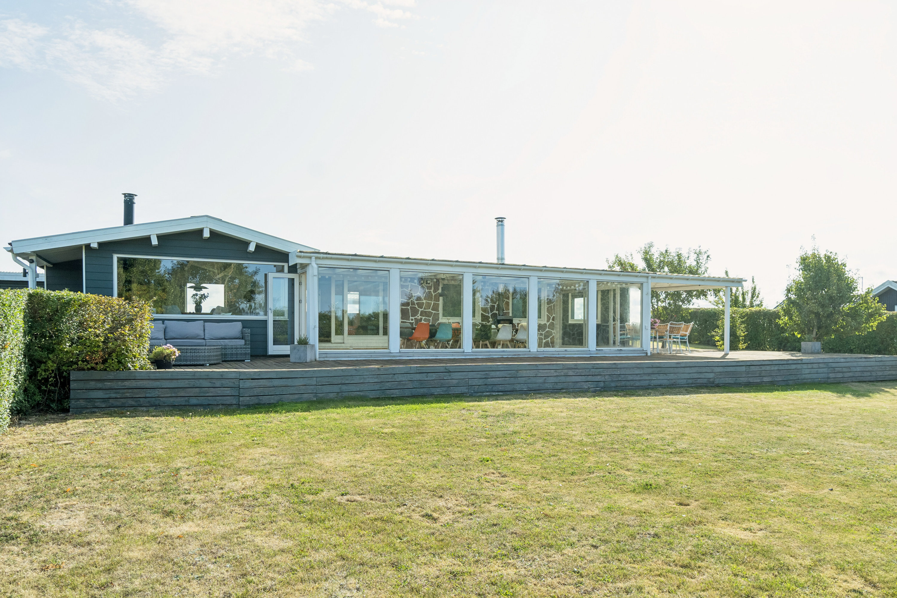 Fremhævet set fra haven billede i fuldskærmstilstand. Billede af Højgårdsvej 10, Næsby Strand, 4200 Slagelse