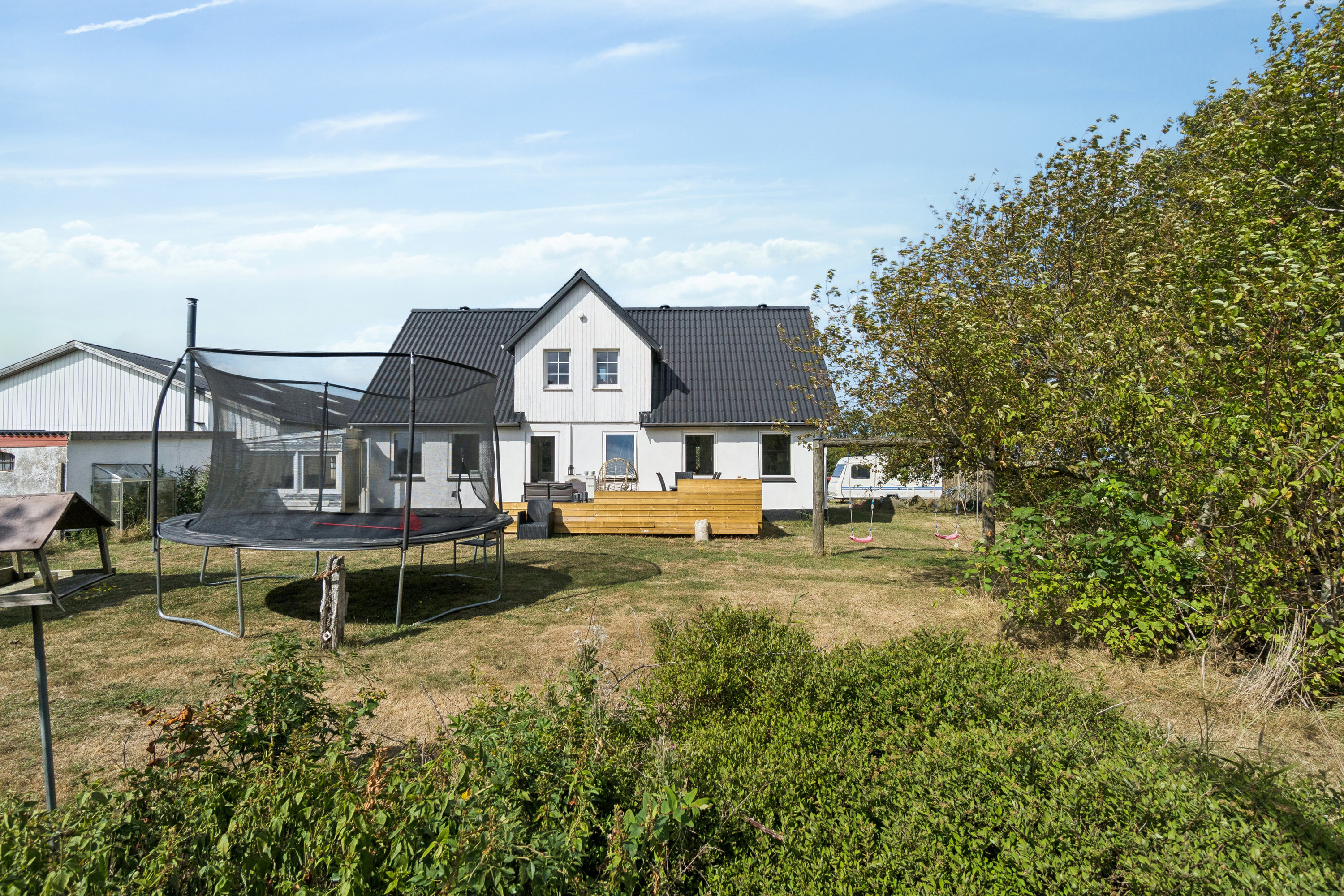 Fremhævet set fra haven billede i fuldskærmstilstand. Billede af Glappevej 4, Østermarie, 3751 Østermarie