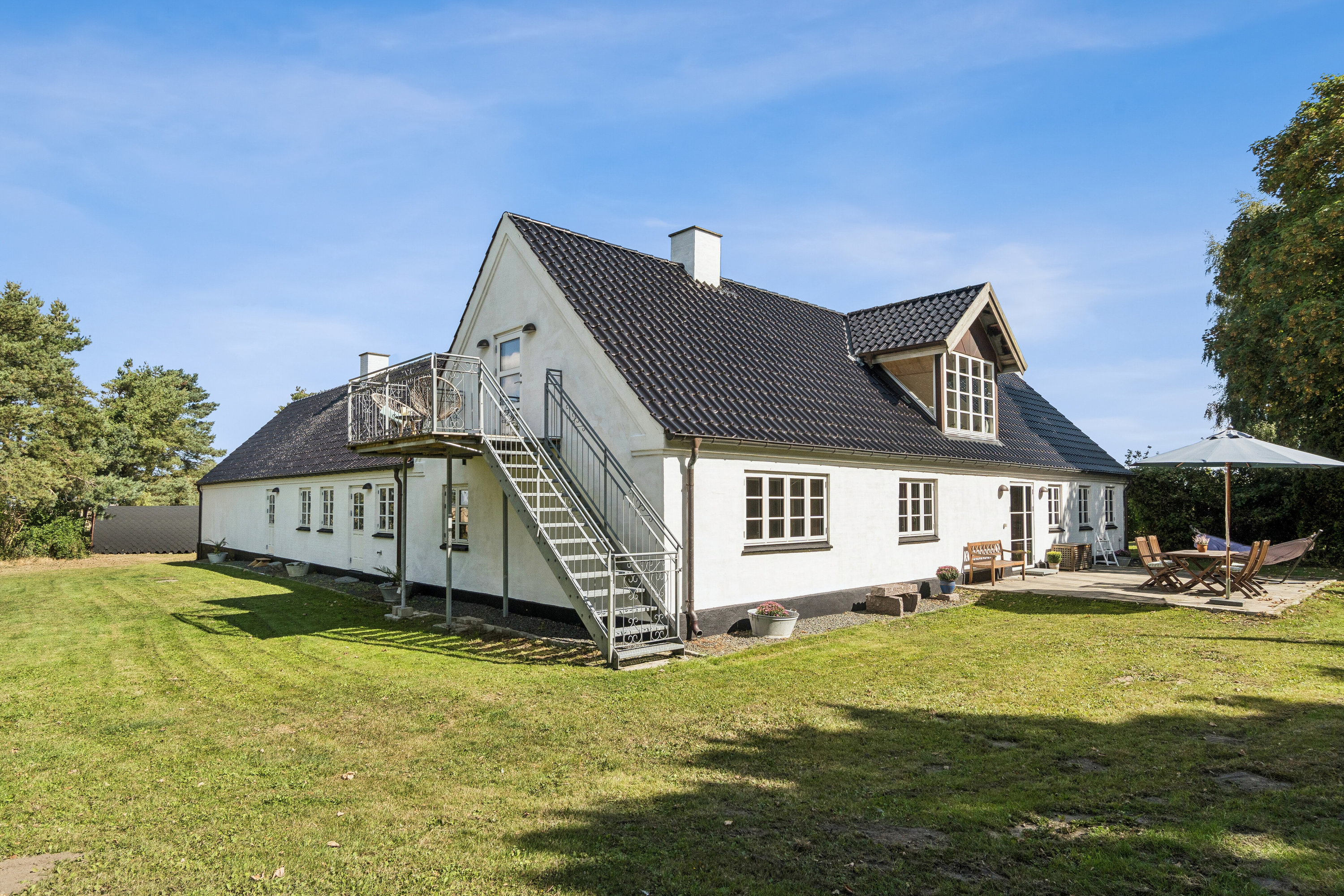 Fremhævet set fra haven billede i fuldskærmstilstand. Billede af Bavnevej 8, Tyvelse, 4171 Glumsø