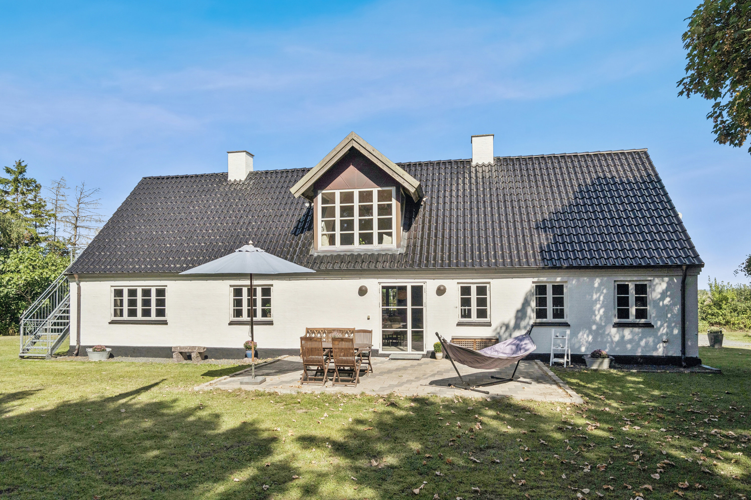 Fremhævet set fra haven billede i fuldskærmstilstand. Billede af Bavnevej 8, Tyvelse, 4171 Glumsø