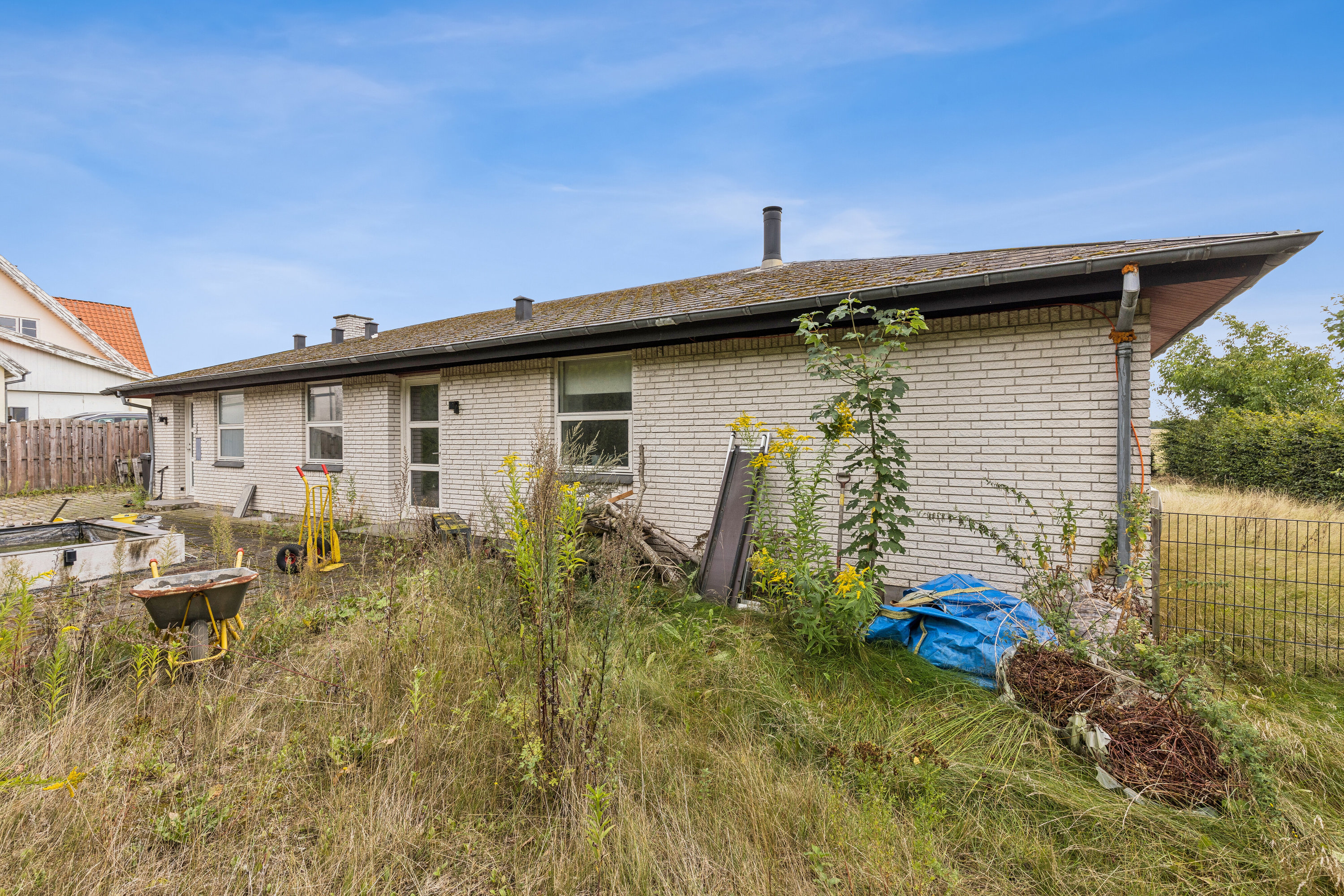 Fremhævet set fra haven billede i fuldskærmstilstand. Billede af Årslevvej 24, 4200 Slagelse
