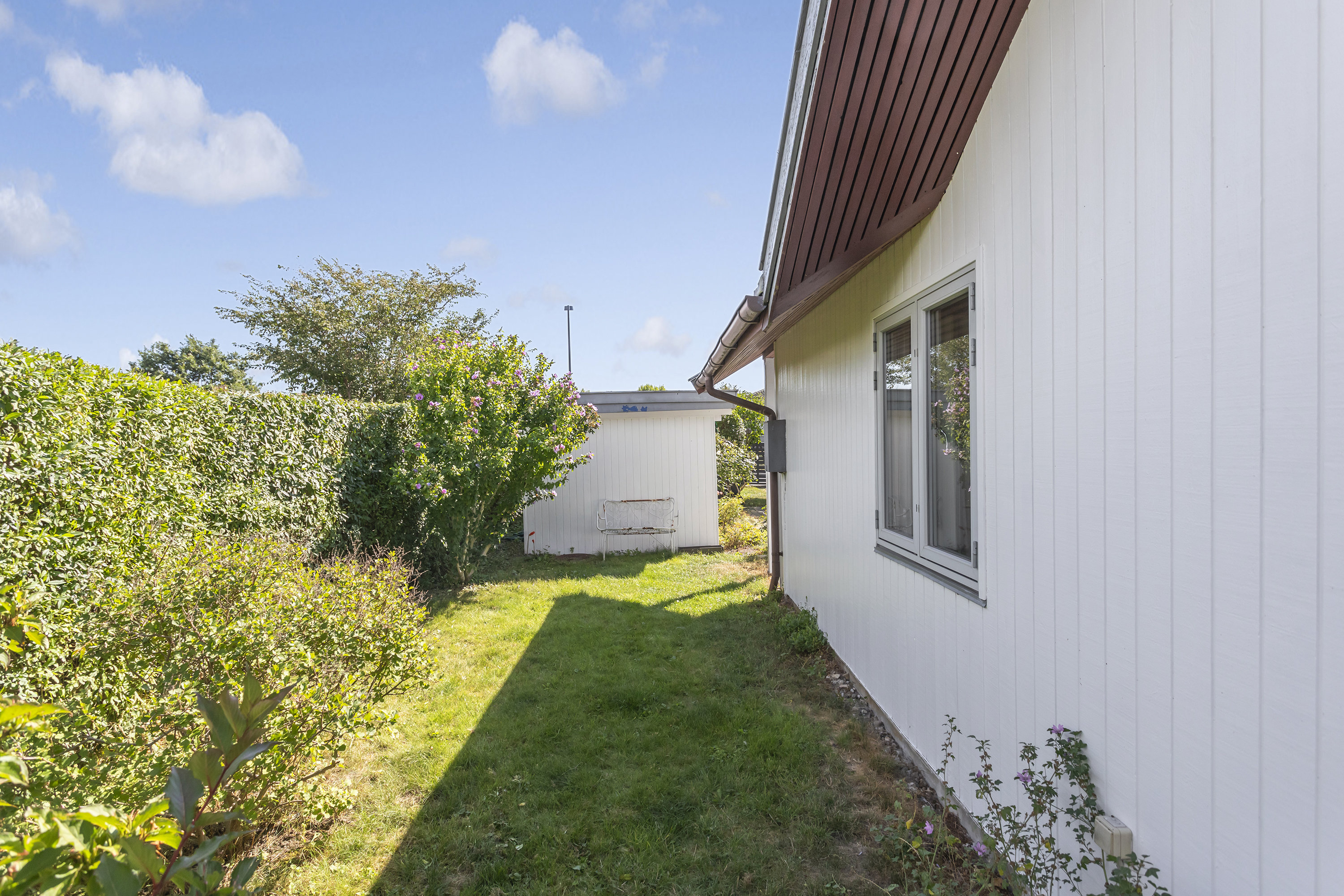 Fremhævet facade billede i fuldskærmstilstand. Billede af Stenrosevej 11, 2300 København S
