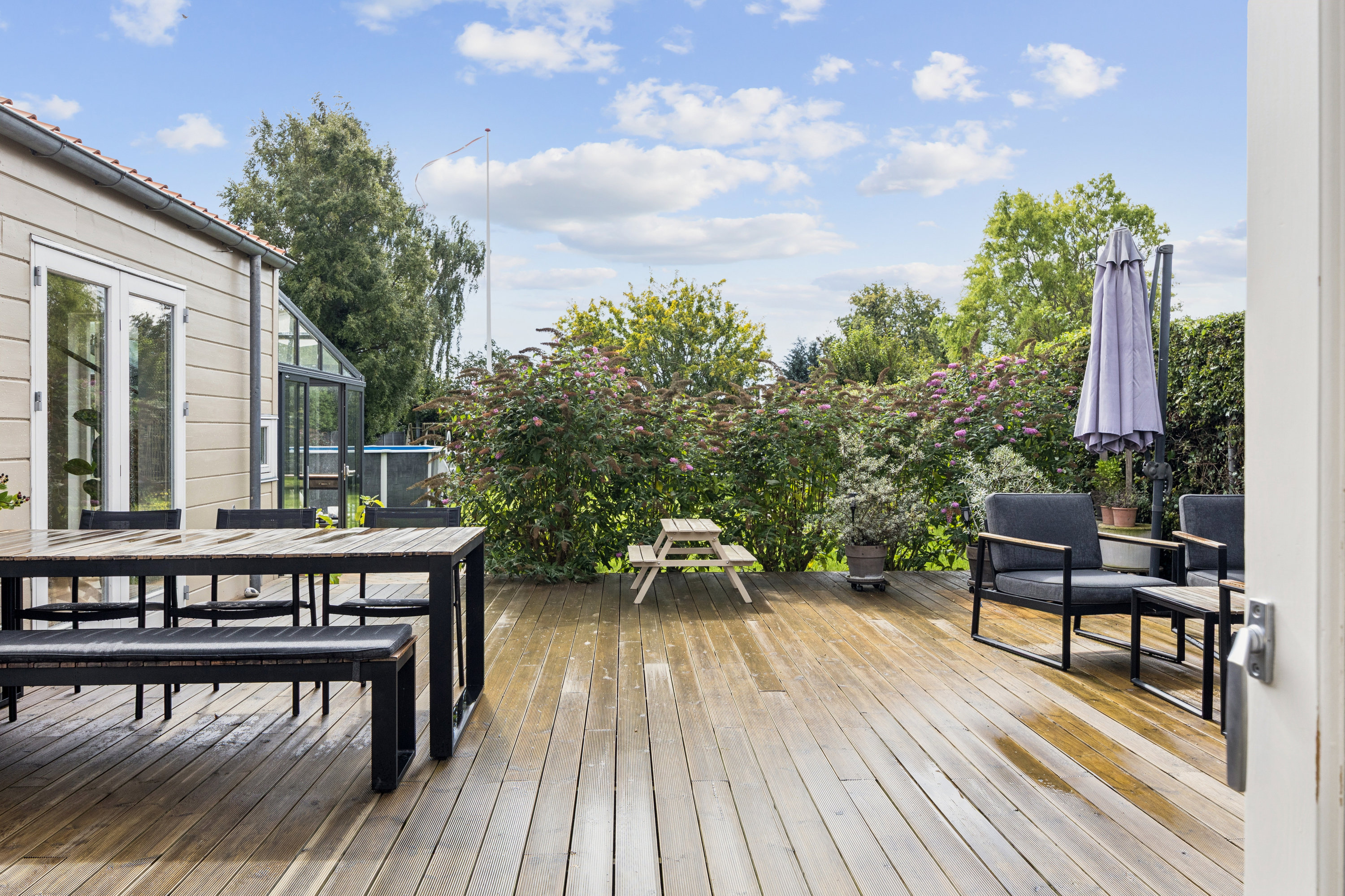 Fremhævet terrasse billede i fuldskærmstilstand. Billede af Karisevej 78, Dalby, 4690 Haslev
