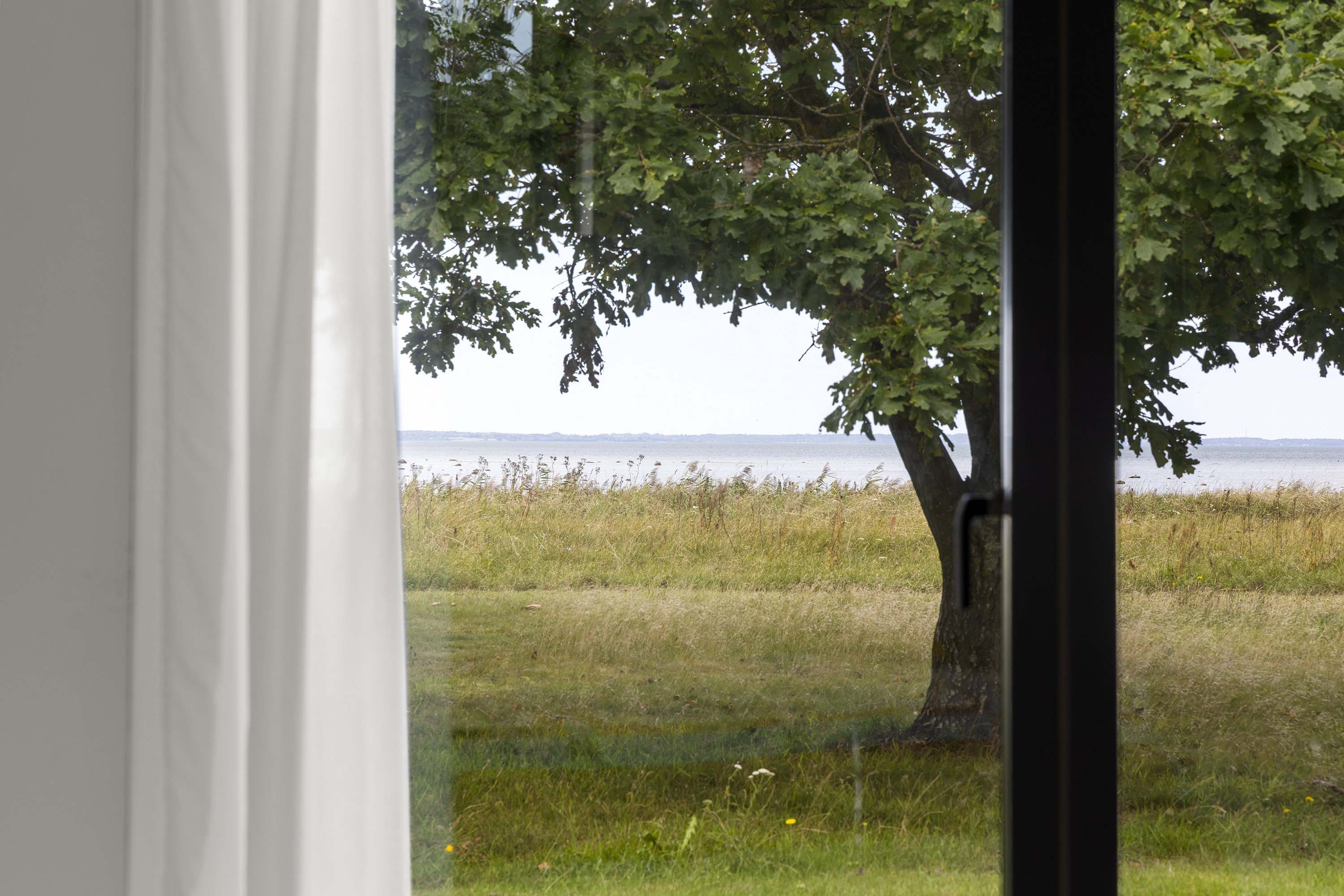 Fremhævet udsigt billede i fuldskærmstilstand. Billede af Dalby Strandvej 15, Dalby Huse, 3630 Jægerspris