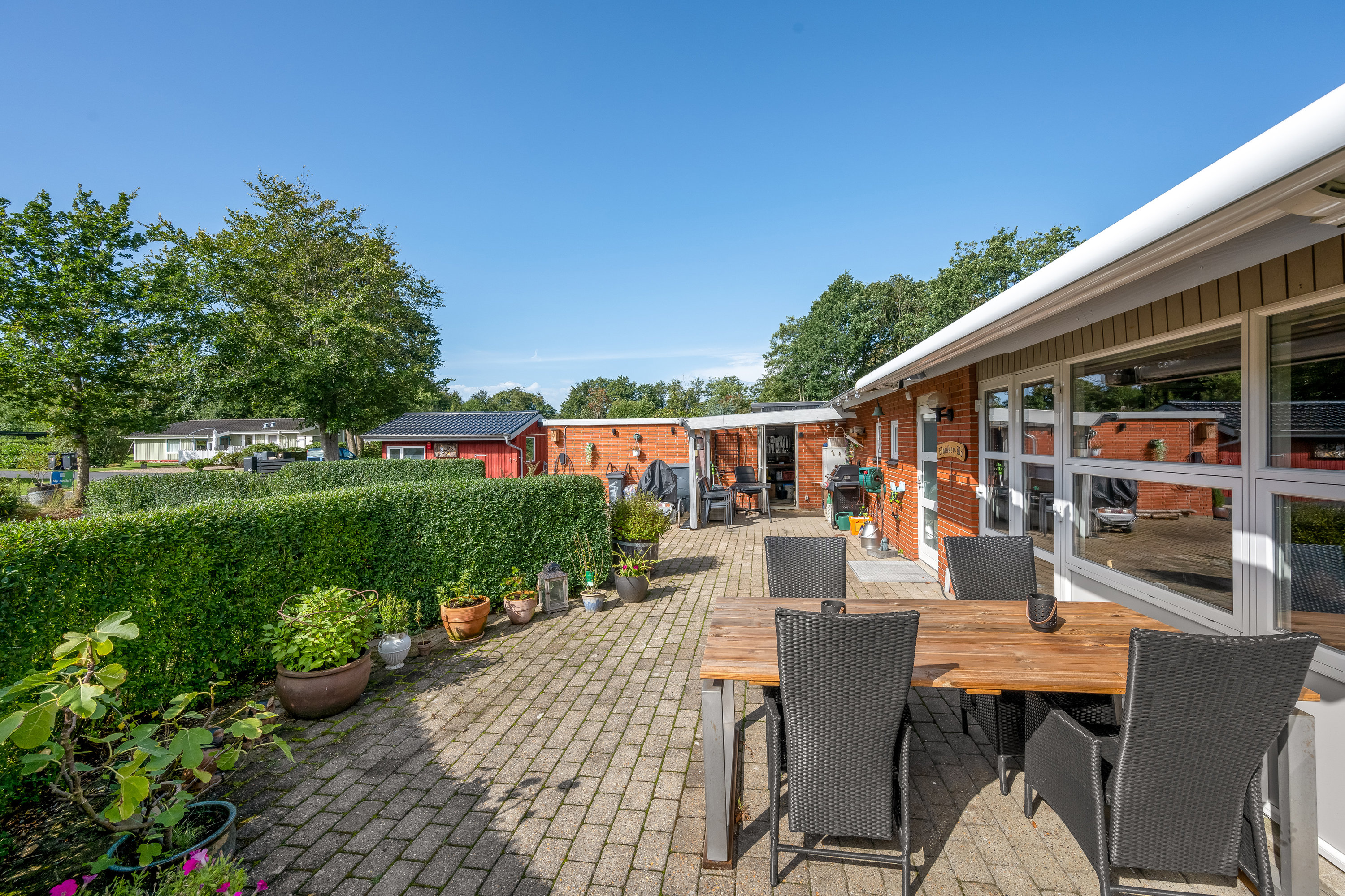 Fremhævet terrasse billede i fuldskærmstilstand. Billede af Lappedykkervænget 32, Bork Havn, 6893 Hemmet