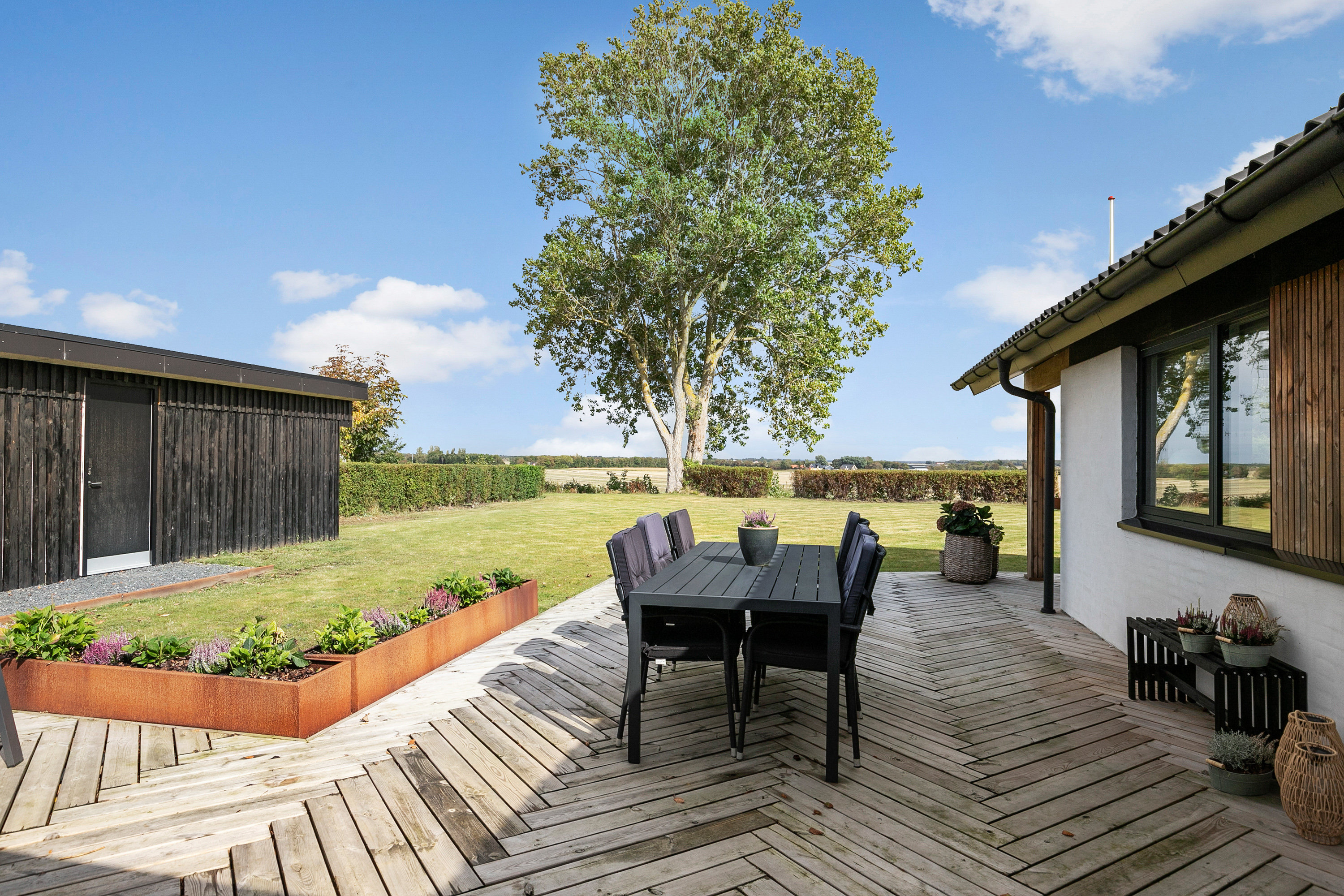 Fremhævet terrasse billede i fuldskærmstilstand. Billede af Hybenvej 4, 9460 Brovst