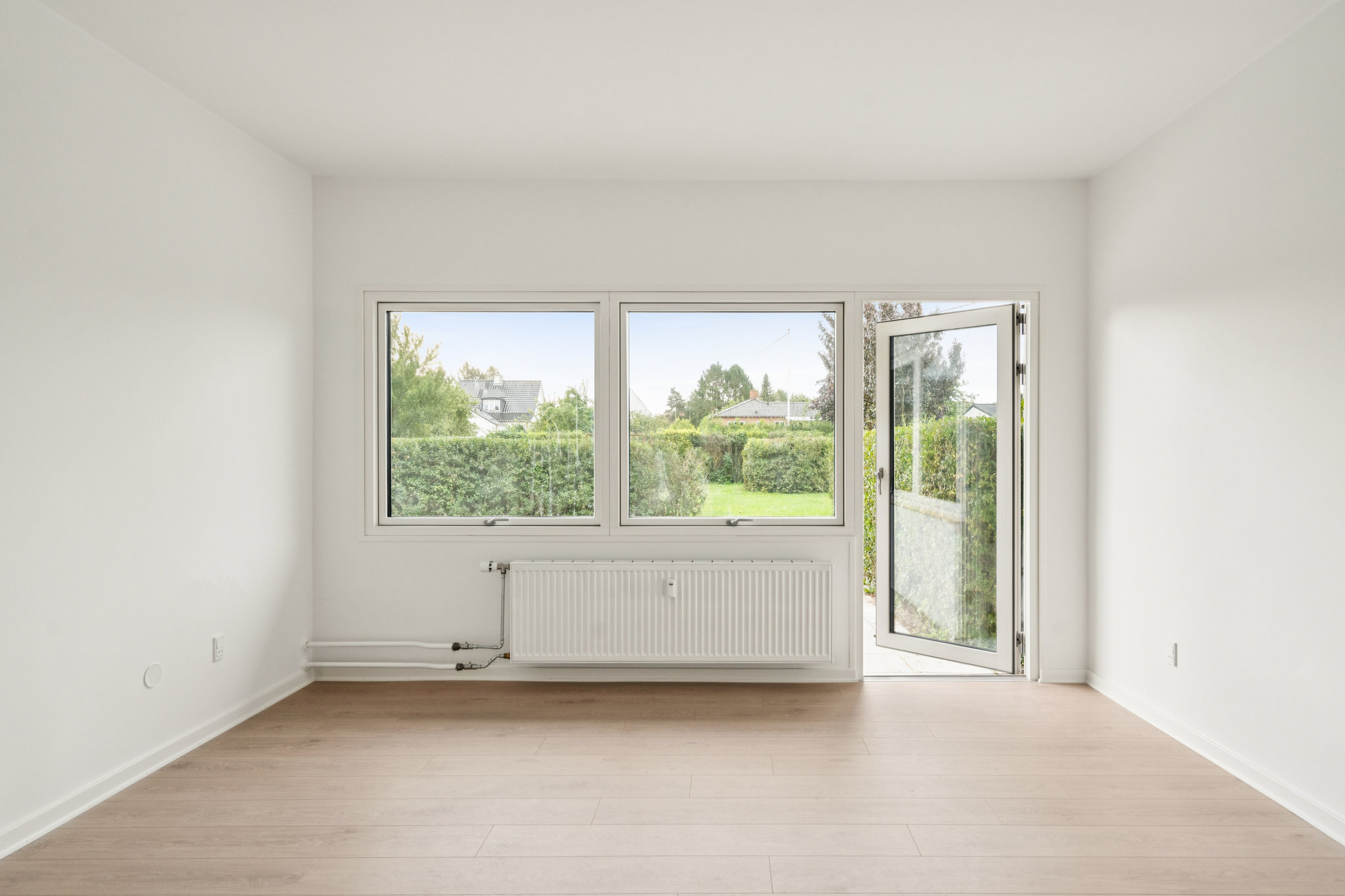 Fremhævet stue billede i fuldskærmstilstand. Billede af Bækkelundsvej 4, st. th., 8930 Randers NØ