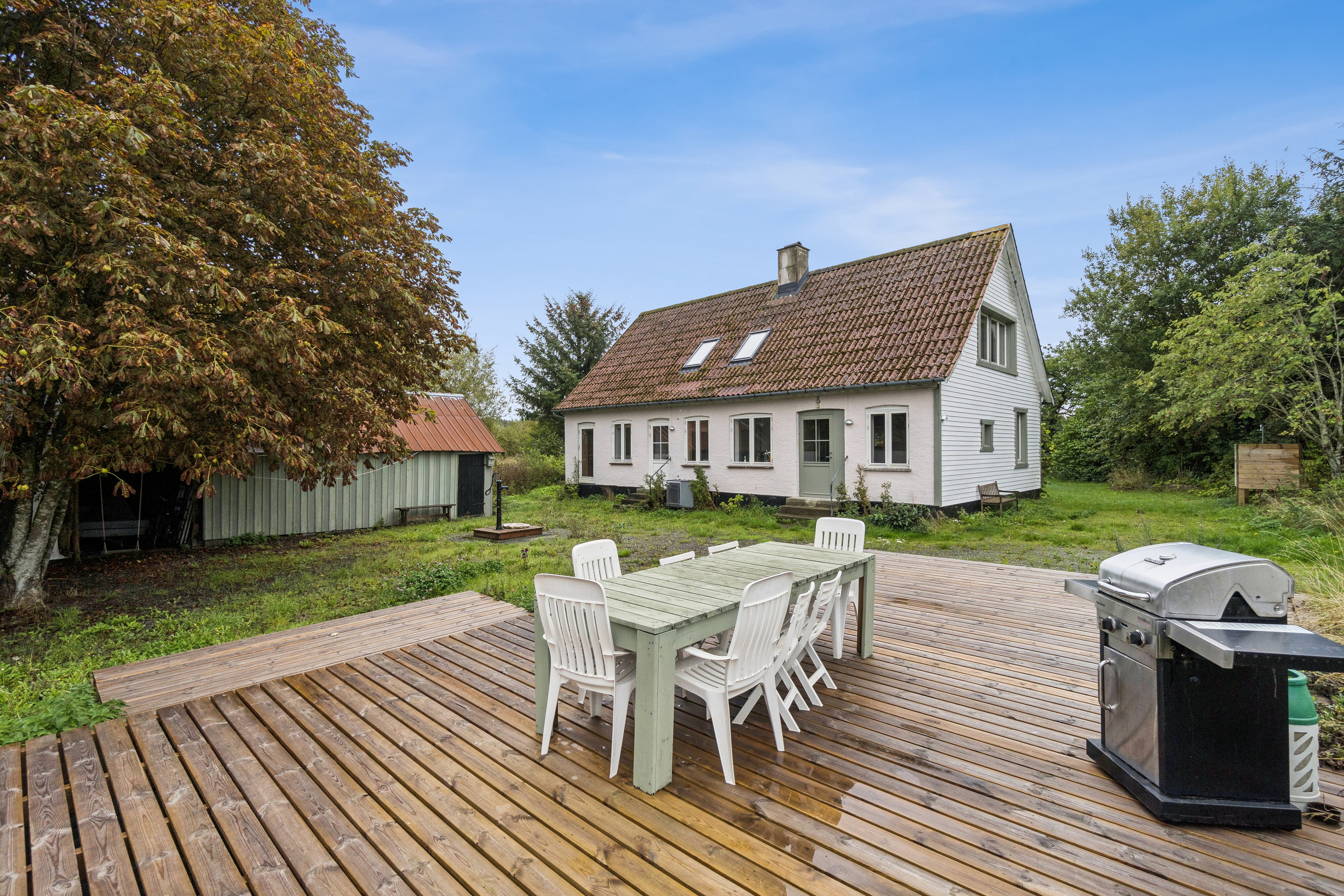 Fremhævet terrasse billede i fuldskærmstilstand. Billede af Flæskedalsvej 1, Østerlars, 3760 Gudhjem