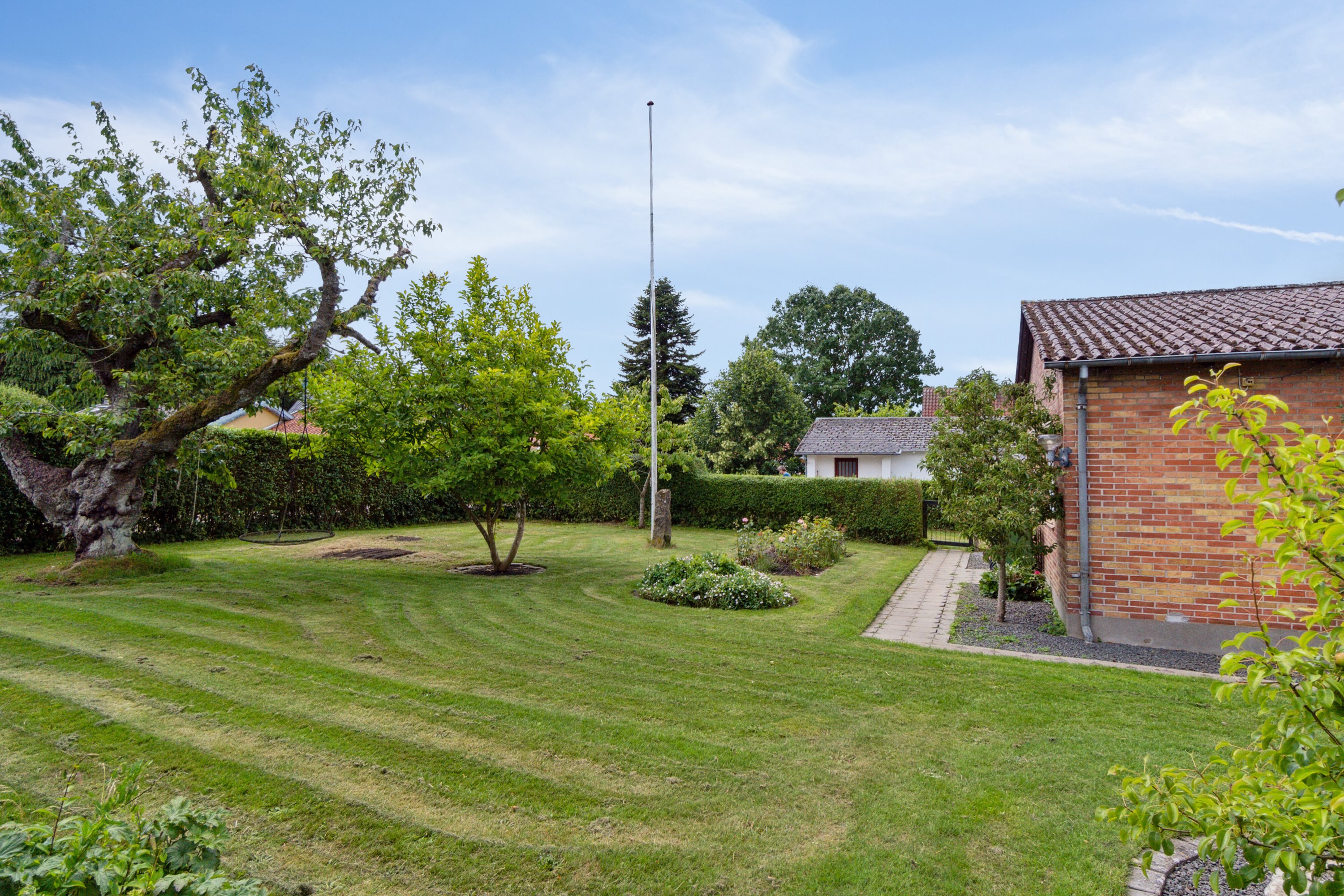 Fremhævet set fra haven billede i fuldskærmstilstand. Billede af Lundevej 4, Korinth, 5600 Faaborg
