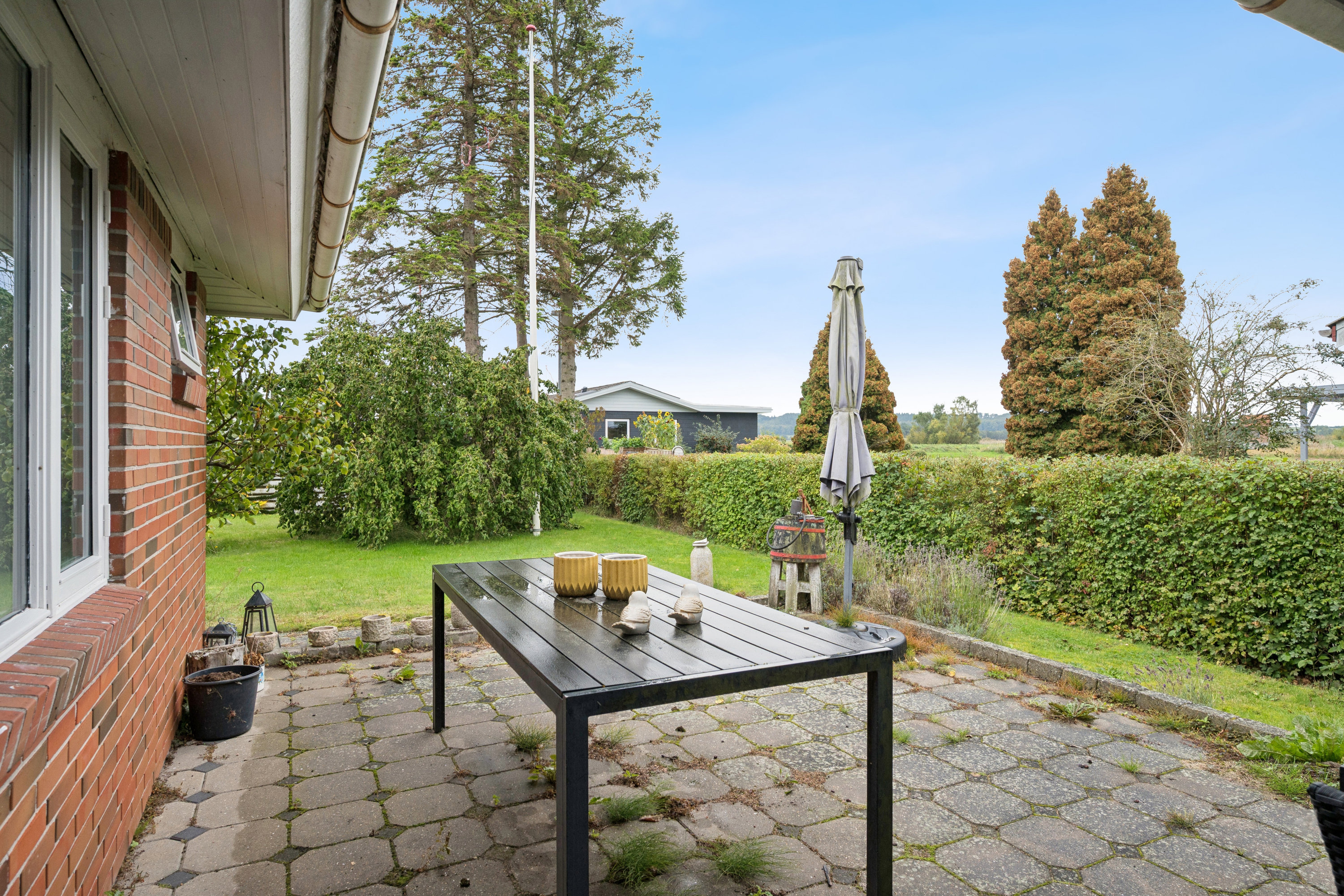 Fremhævet terrasse billede i fuldskærmstilstand. Billede af Ålykkevej 20, 8961 Allingåbro