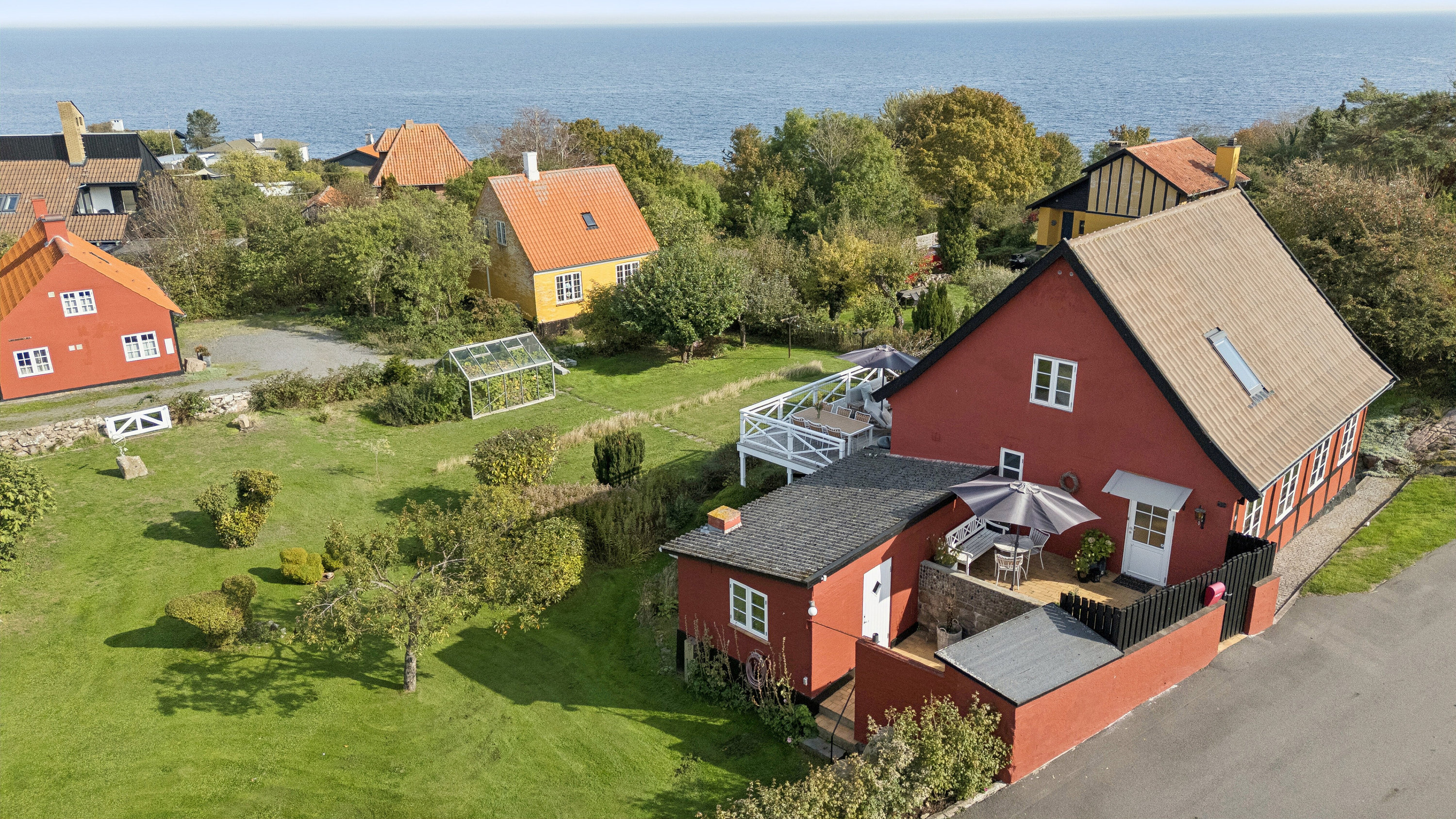 Fremhævet luftfoto billede i fuldskærmstilstand. Billede af Melsted Langgade 56, 3760 Gudhjem