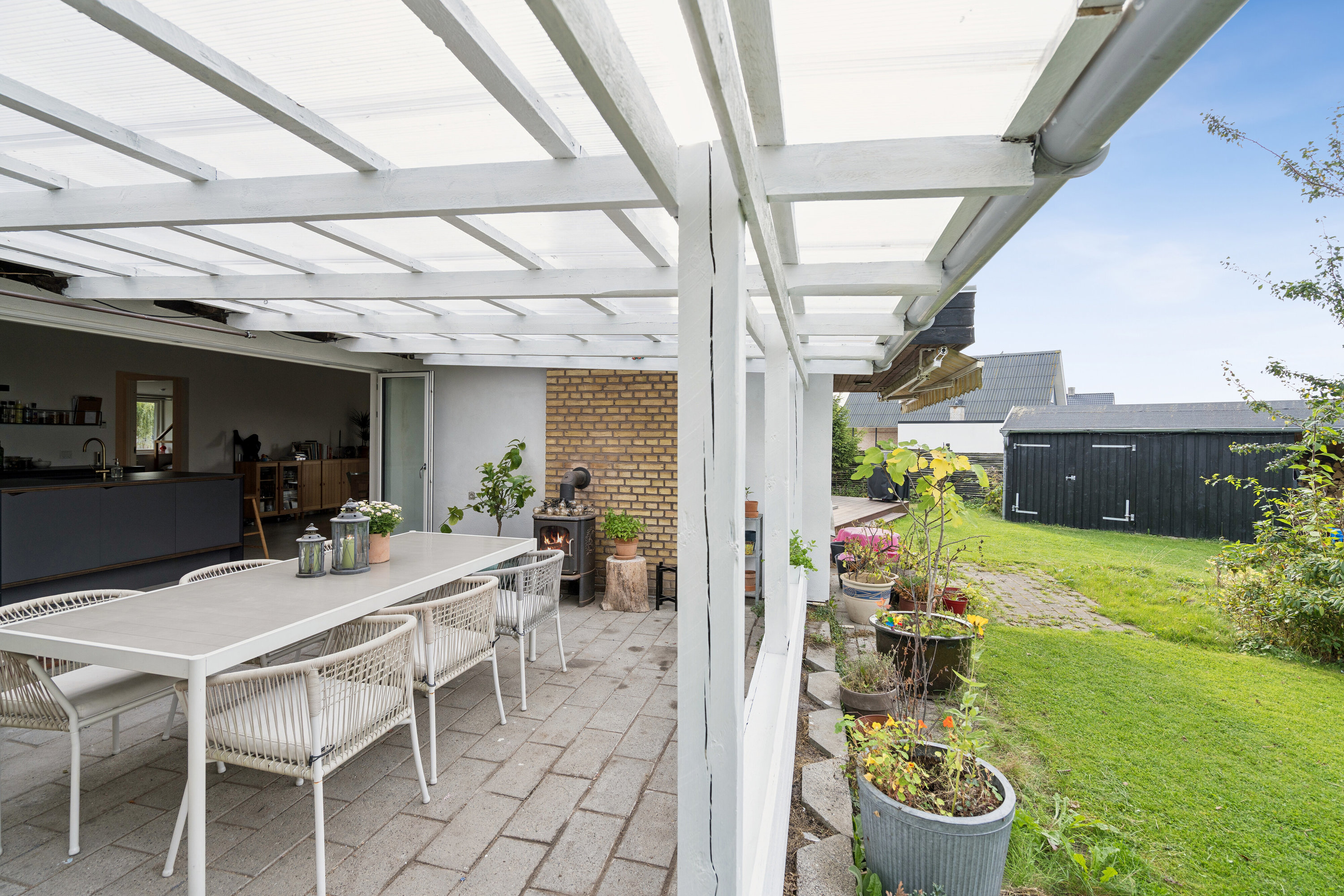 Fremhævet overdækket terrasse billede i fuldskærmstilstand. Billede af Arkturus Alle 2, 2770 Kastrup