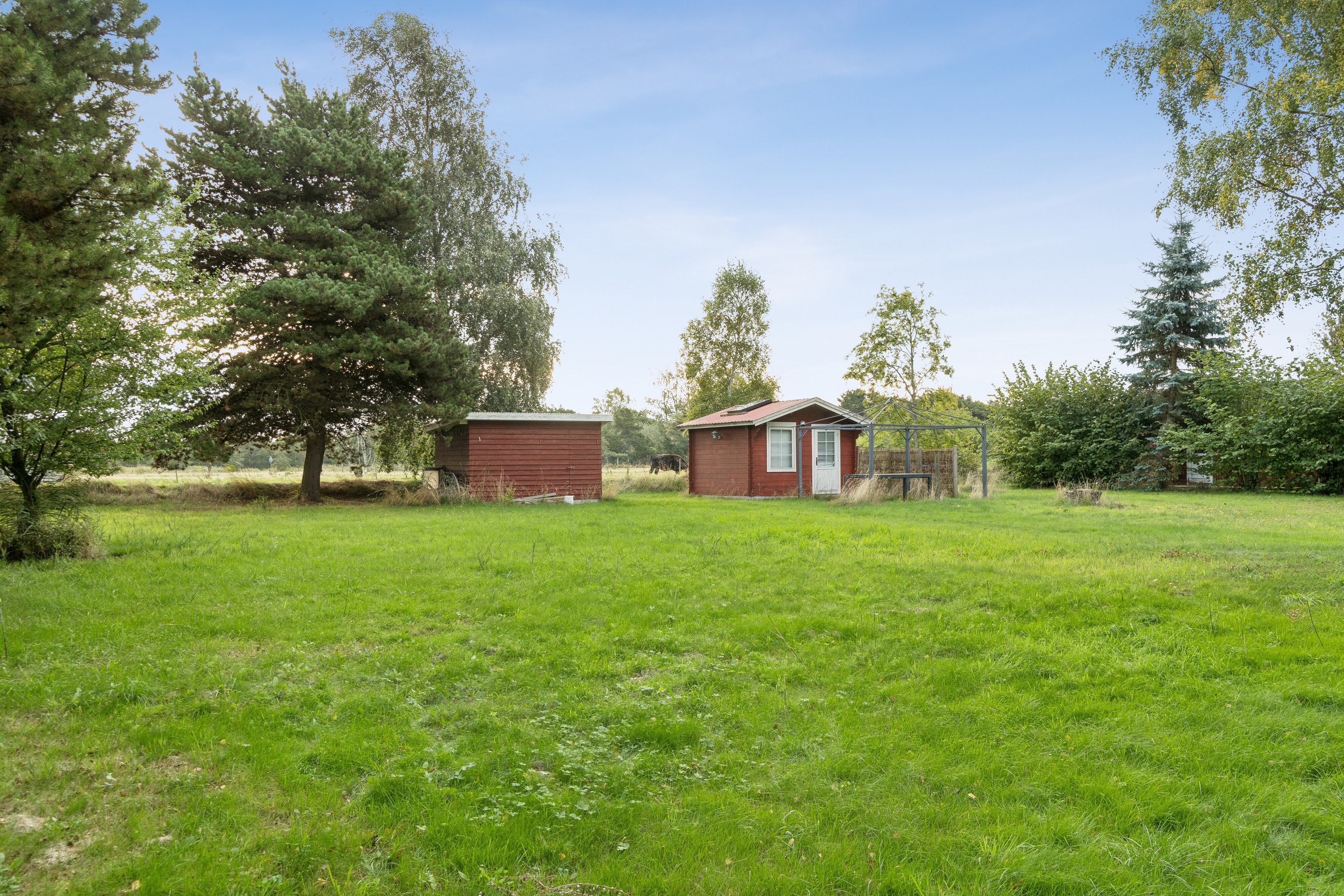 Fremhævet set fra haven billede i fuldskærmstilstand. Billede af Granvej 10E, Reersø Str, 4281 Gørlev