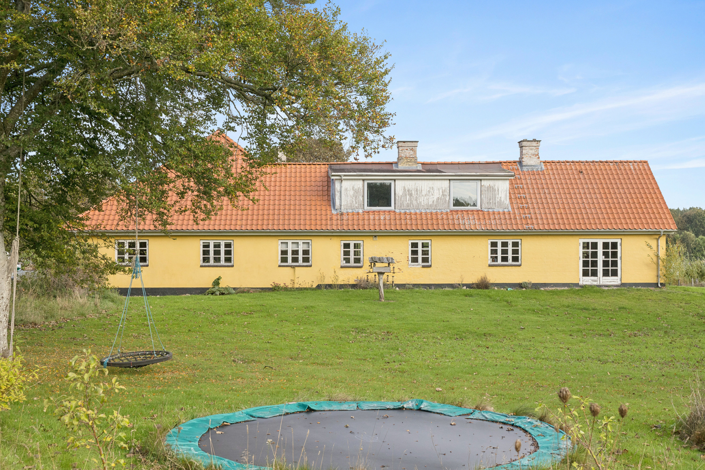 Fremhævet set fra haven billede i fuldskærmstilstand. Billede af Kirkemosevej 153, Hørmested, 9870 Sindal
