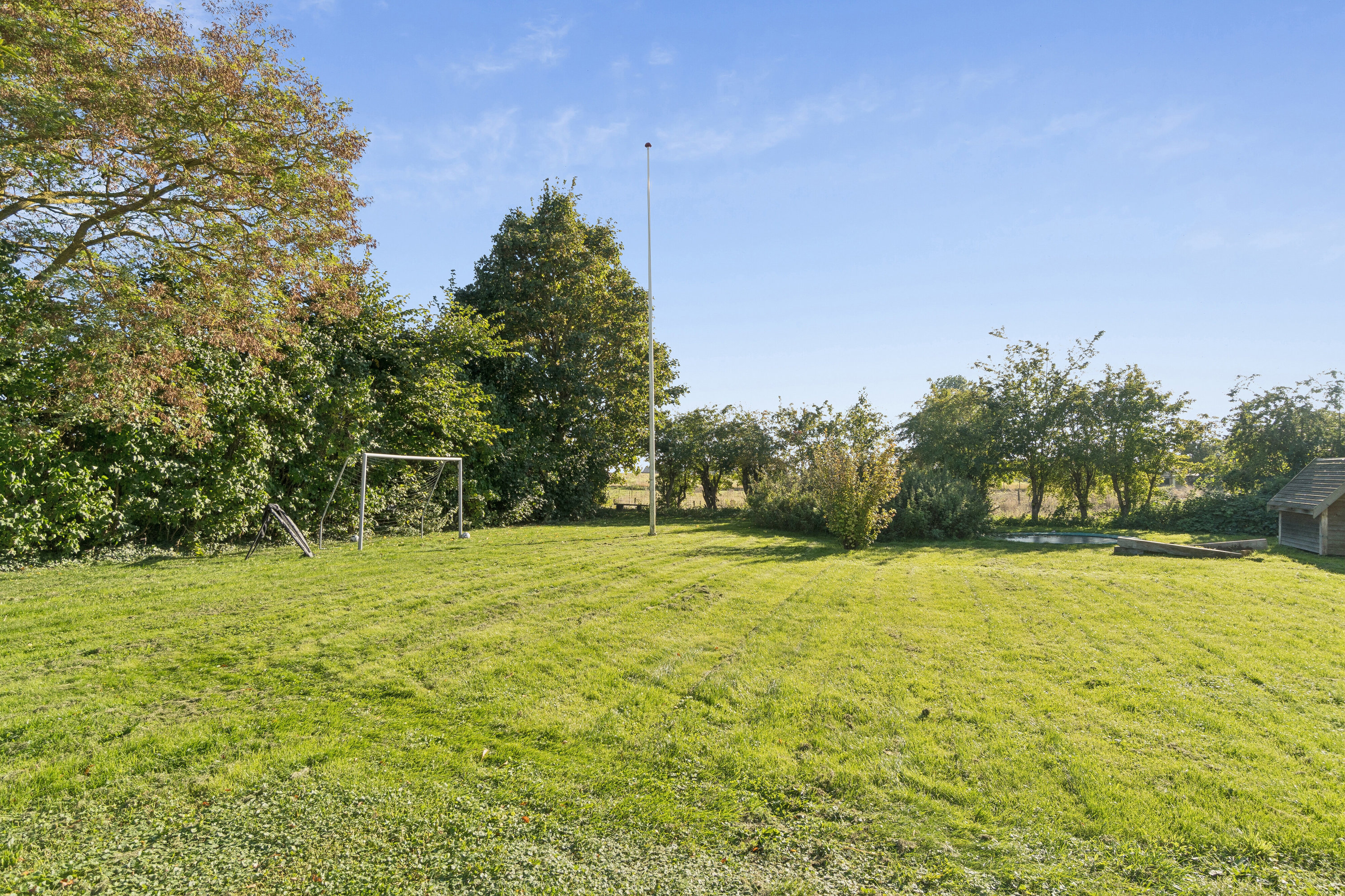 Fremhævet set fra haven billede i fuldskærmstilstand. Billede af Møllevej 12, Tornemark, 4262 Sandved