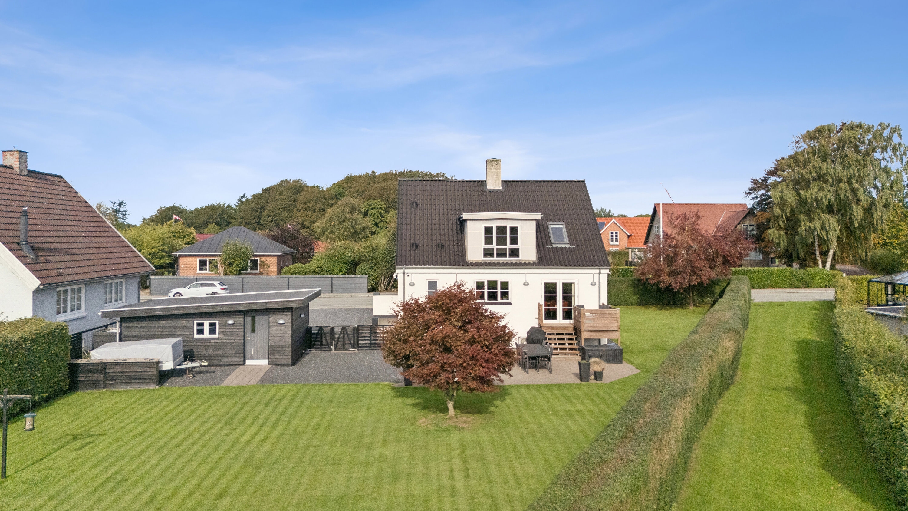 Fremhævet set fra haven billede i fuldskærmstilstand. Billede af Blichersvej 58, Thorning, 8620 Kjellerup
