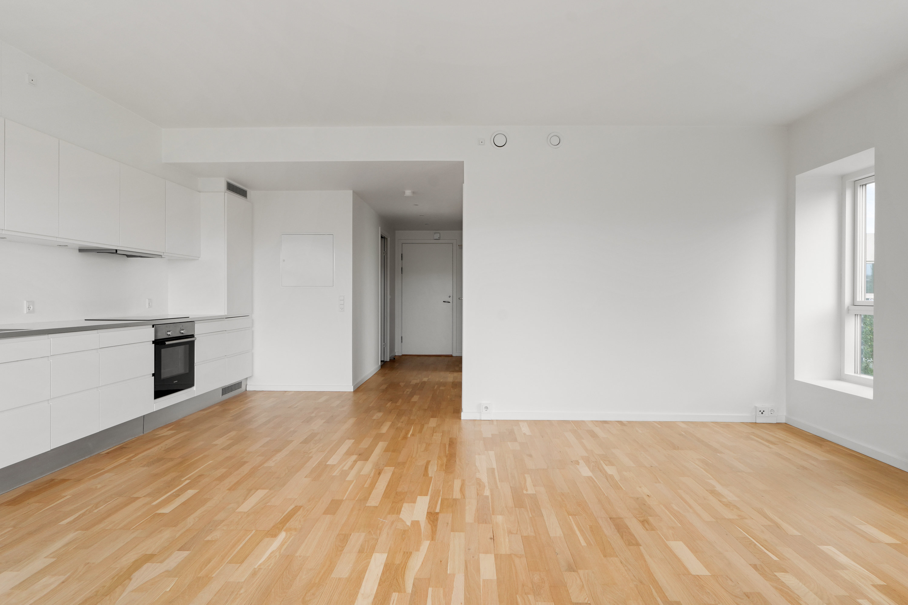 Fremhævet stue billede i fuldskærmstilstand. Billede af Robert Jacobsens Vej 25, st. th., 2300 København S