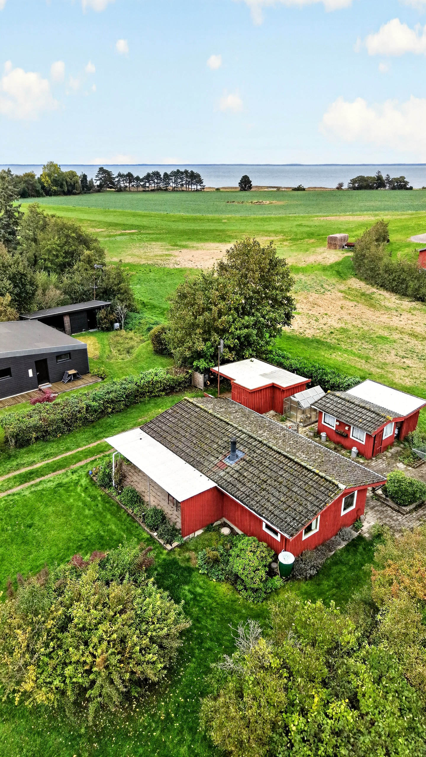 Fremhævet luftfoto billede i fuldskærmstilstand. Billede af Enghaven 26, Næsby, 4305 Orø