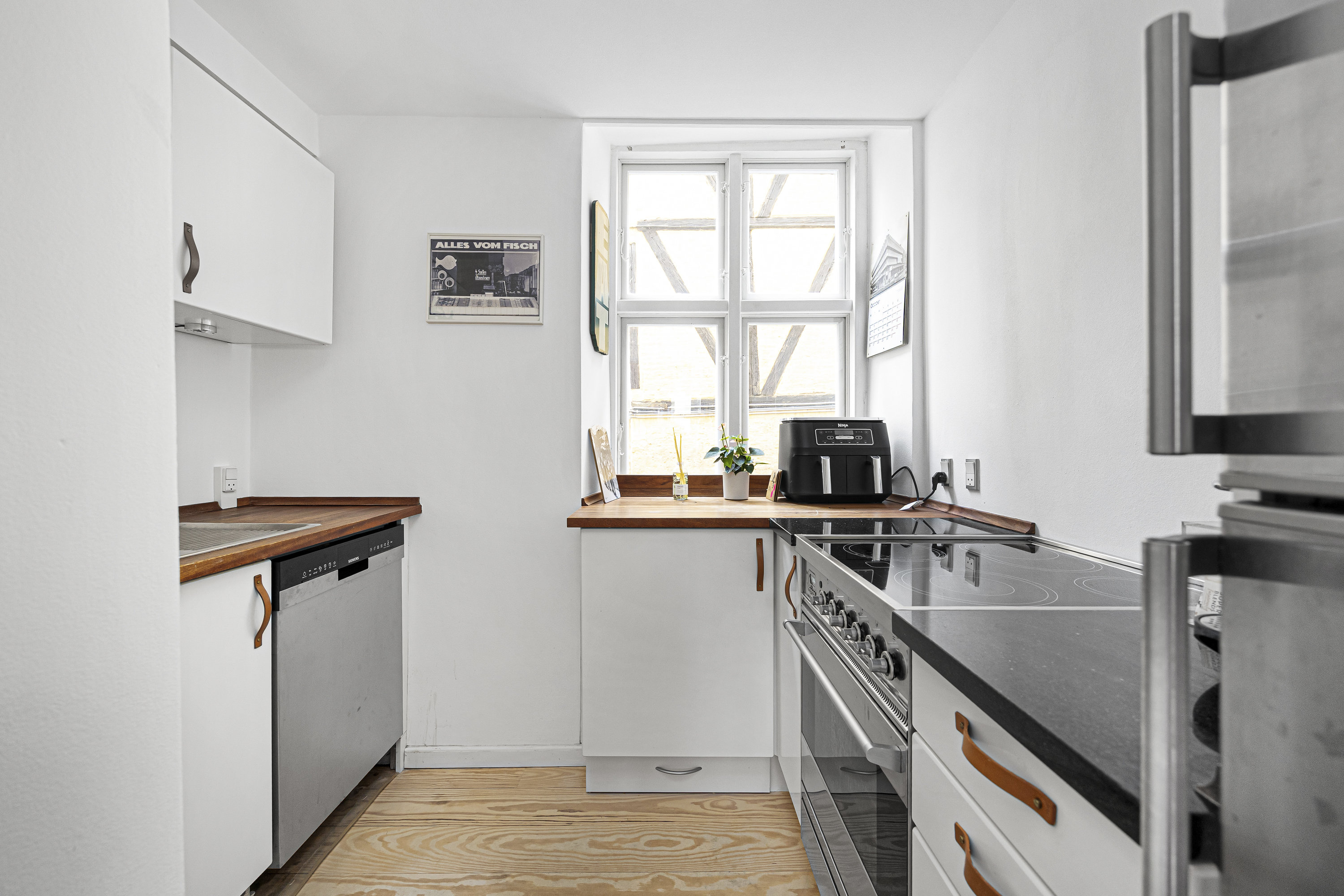 Fremhævet  billede i fuldskærmstilstand. Billede af Rosenborggade 9, st., 1130 København K