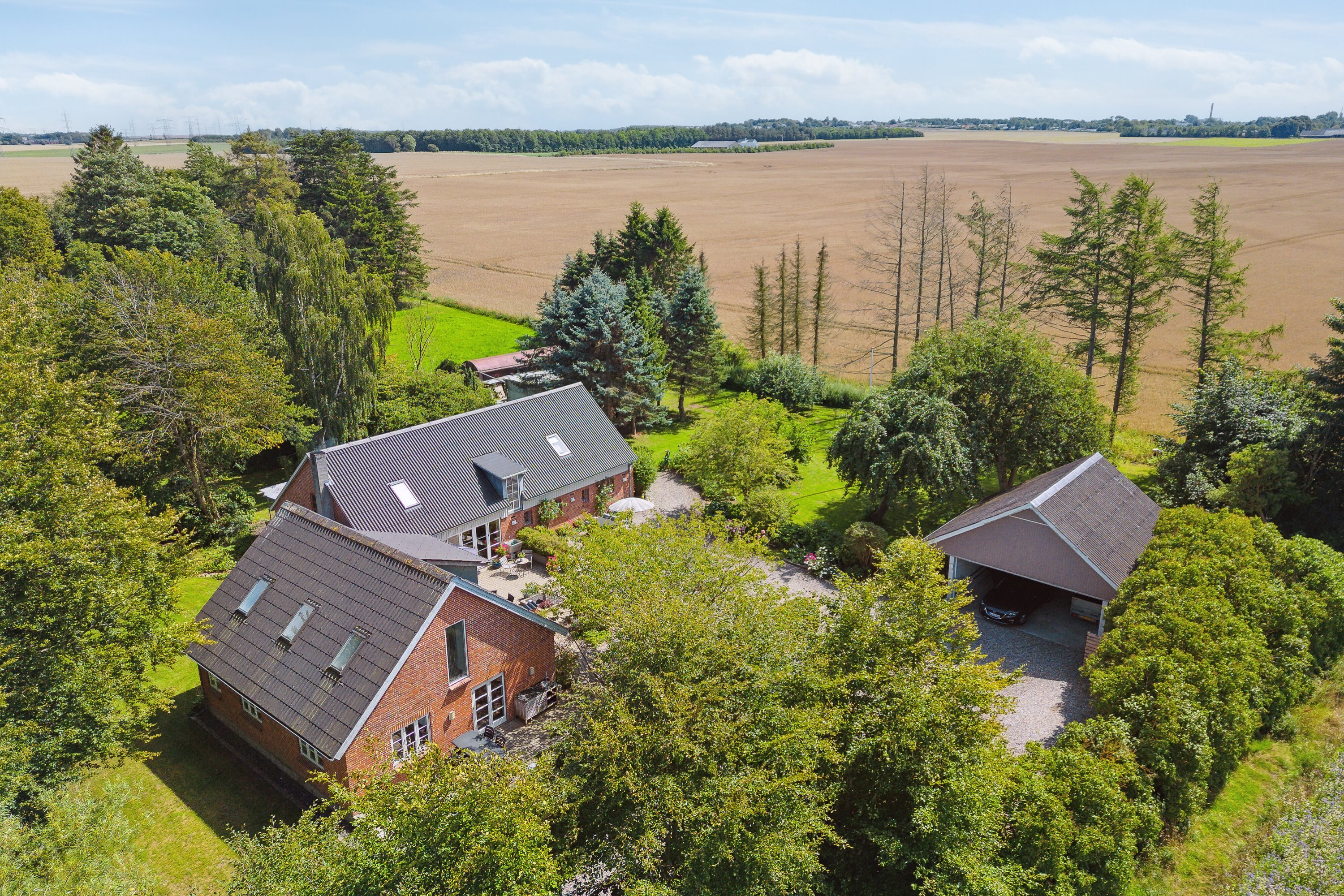 Fremhævet set fra haven billede i fuldskærmstilstand. Billede af Hæstvej 55, 8380 Trige