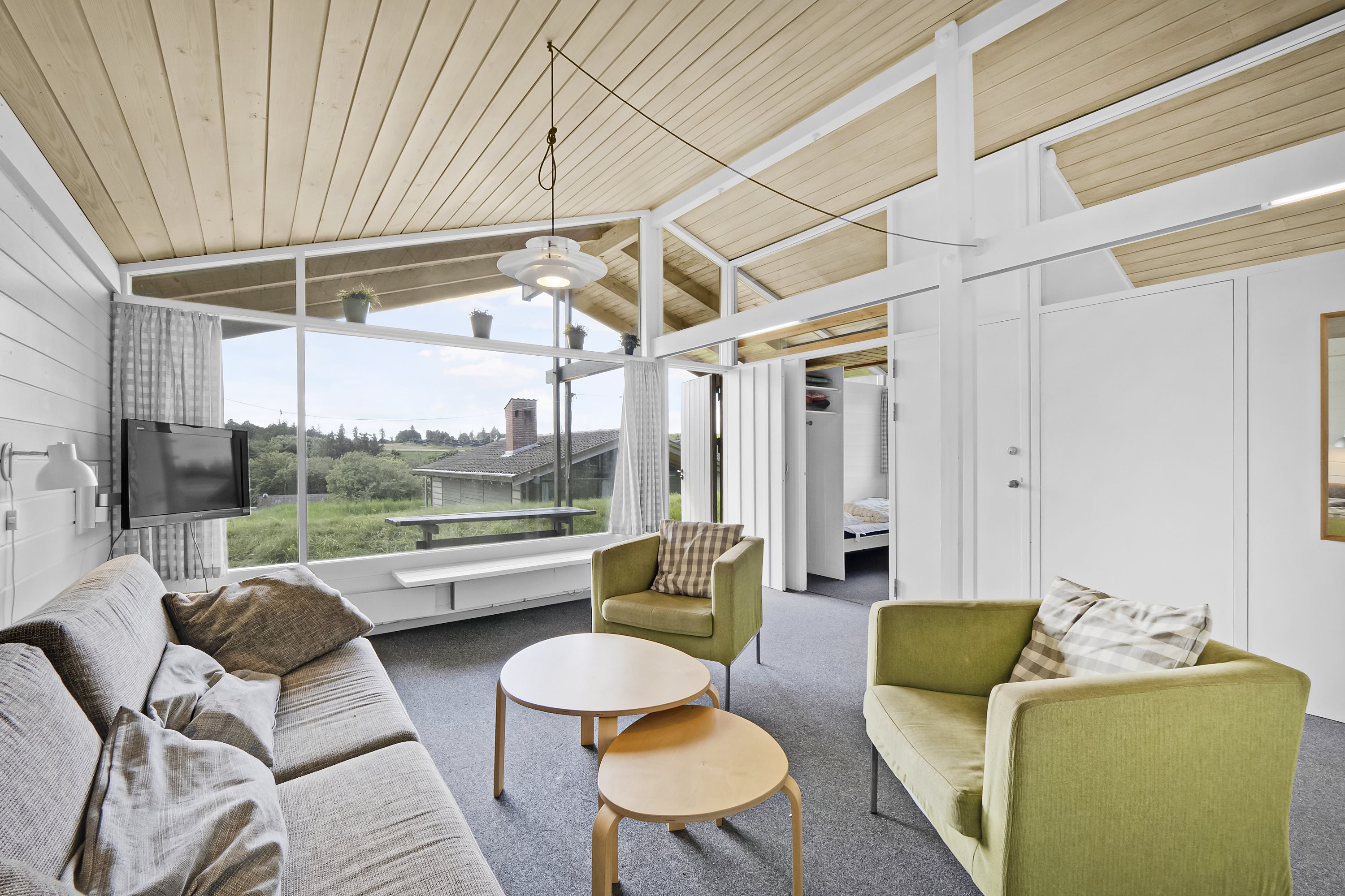 Fremhævet stue billede i fuldskærmstilstand. Billede af Solskinsvej 62, Vigsø, 7730 Hanstholm